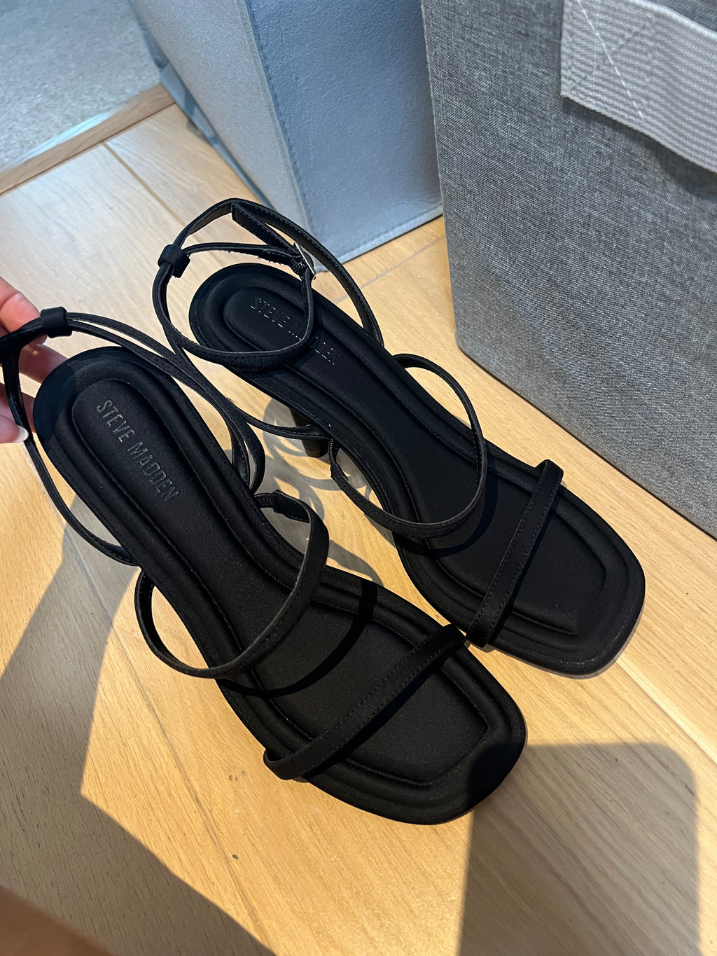 Black Steve Madden heels, buckle strap