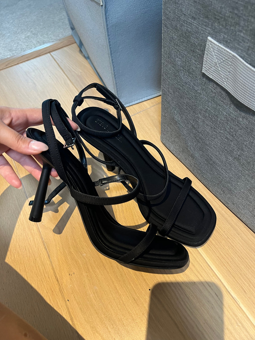 Black Steve Madden heels, buckle strap