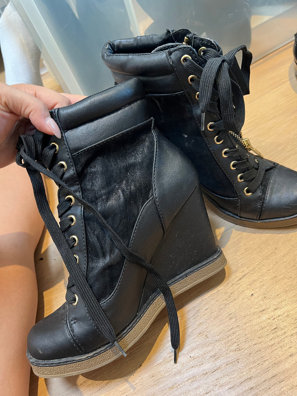 Black wedge heel trainers