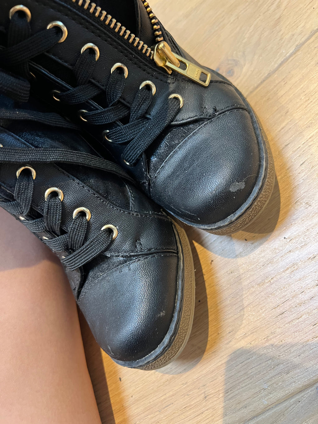 Black wedge heel trainers