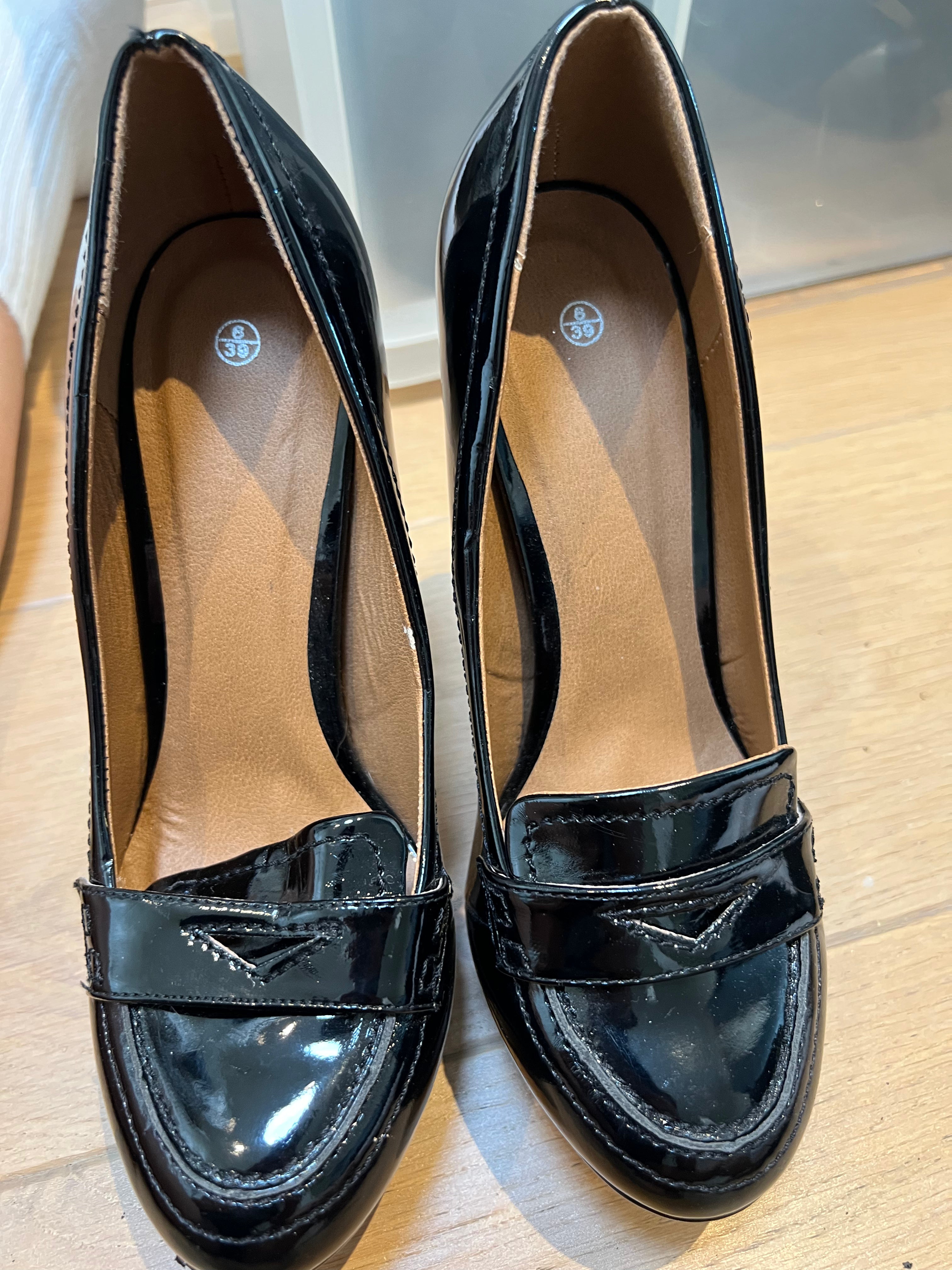 Shiny black heels