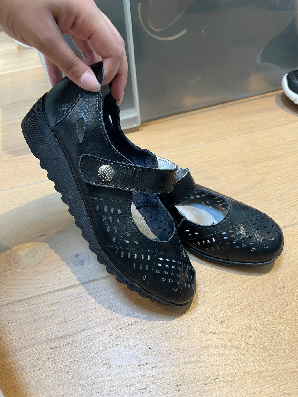 Black pumps with velcro strap