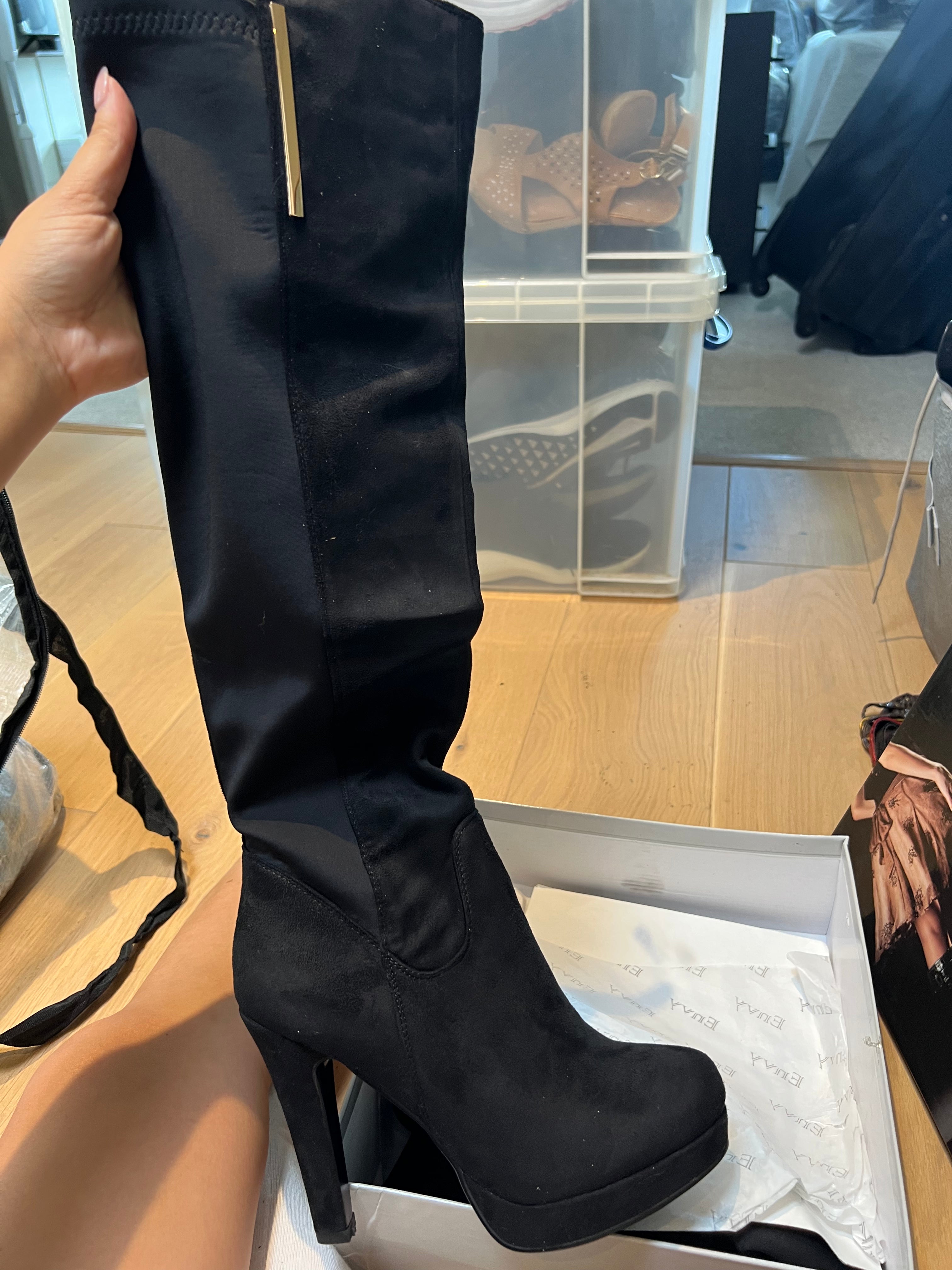 Black thigh boot heels