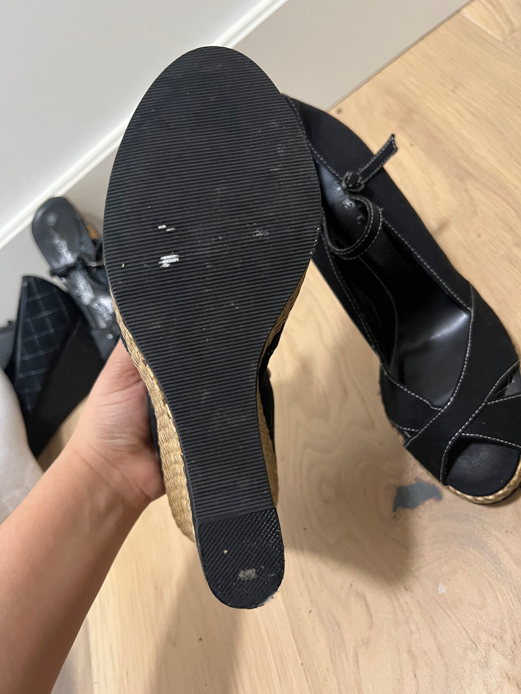 Black heels with woven wedge