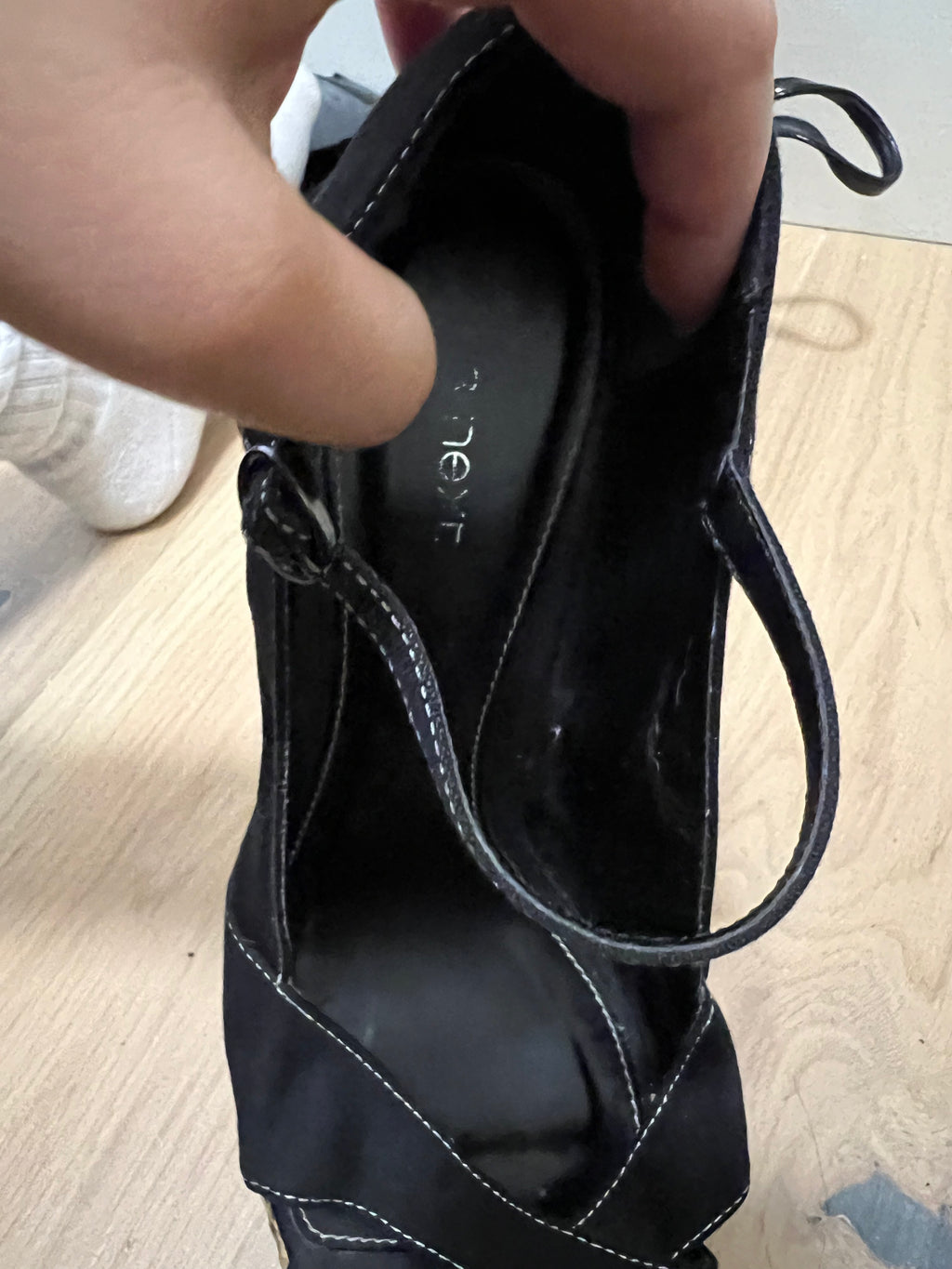 Black heels with woven wedge