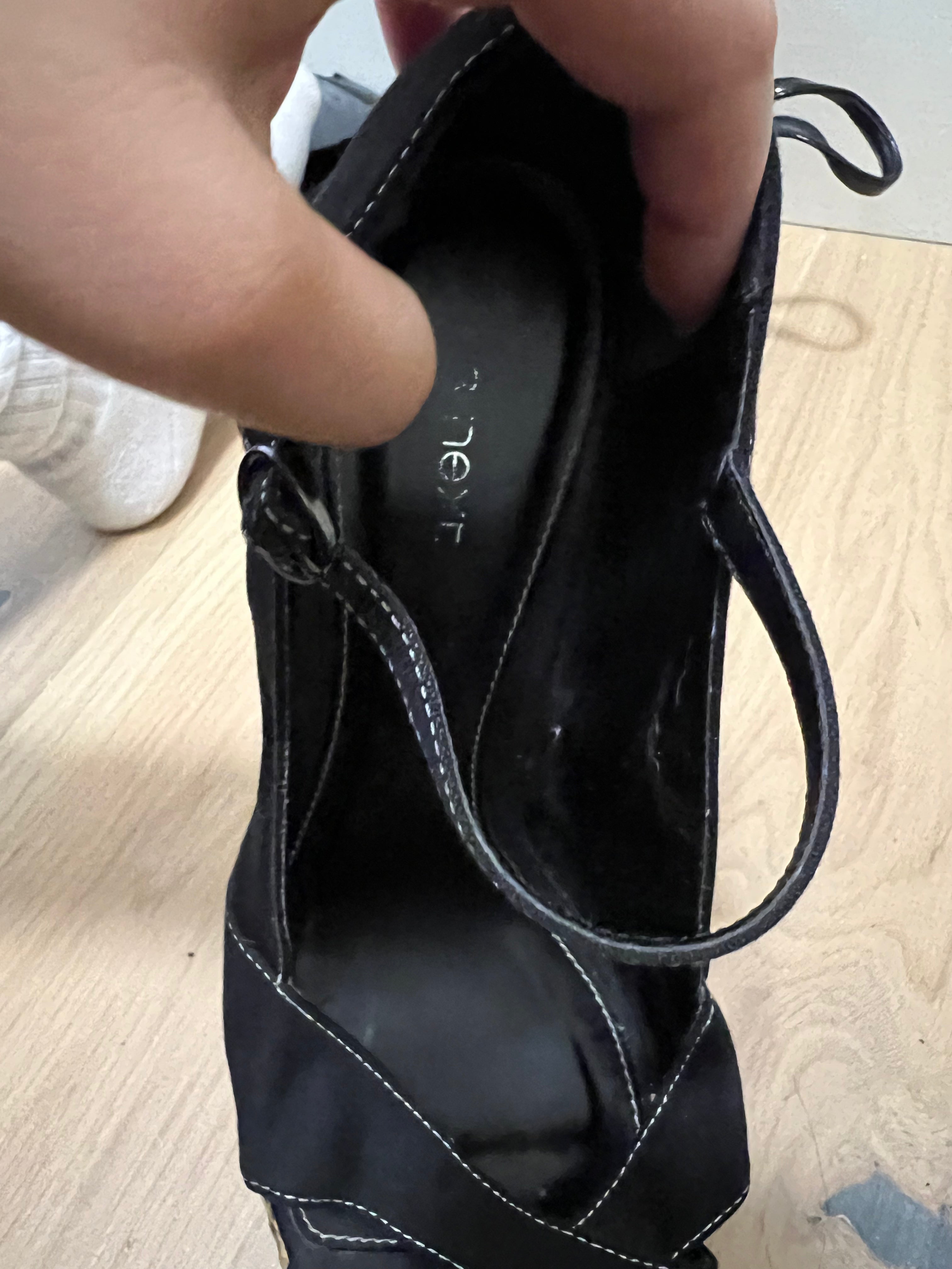 Black heels with woven wedge