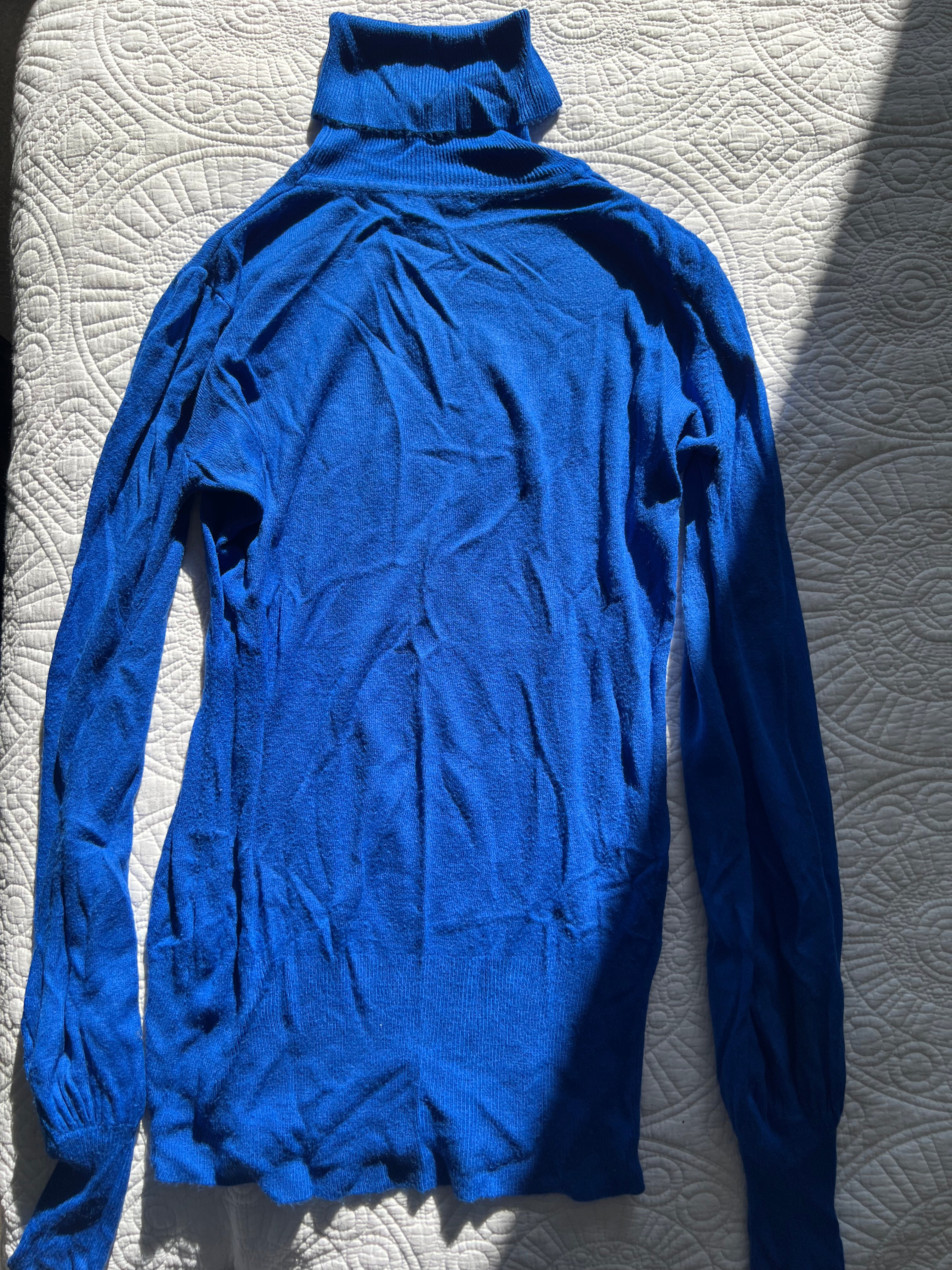 Blue knitted turtleneck top