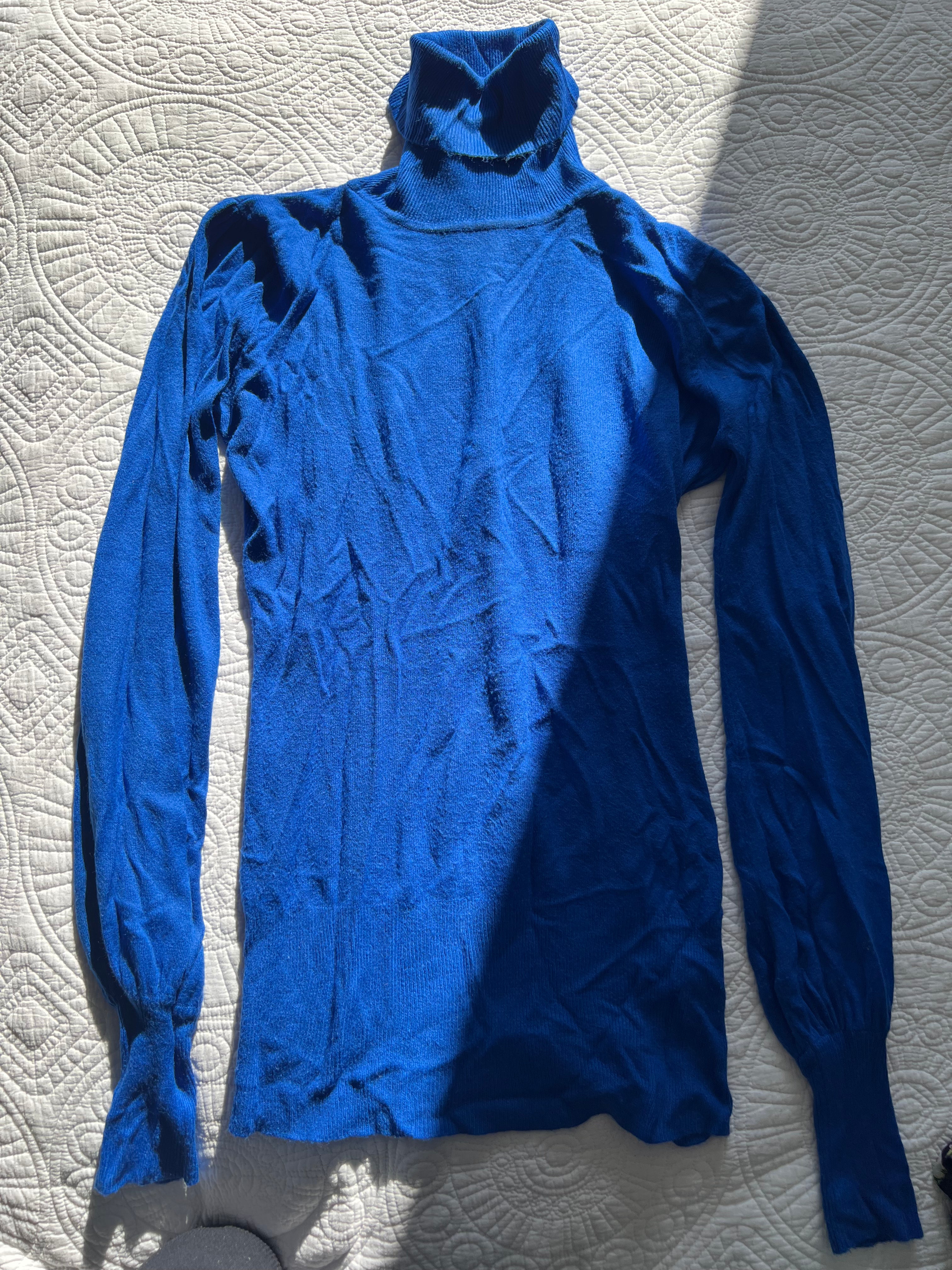 Blue knitted turtleneck top