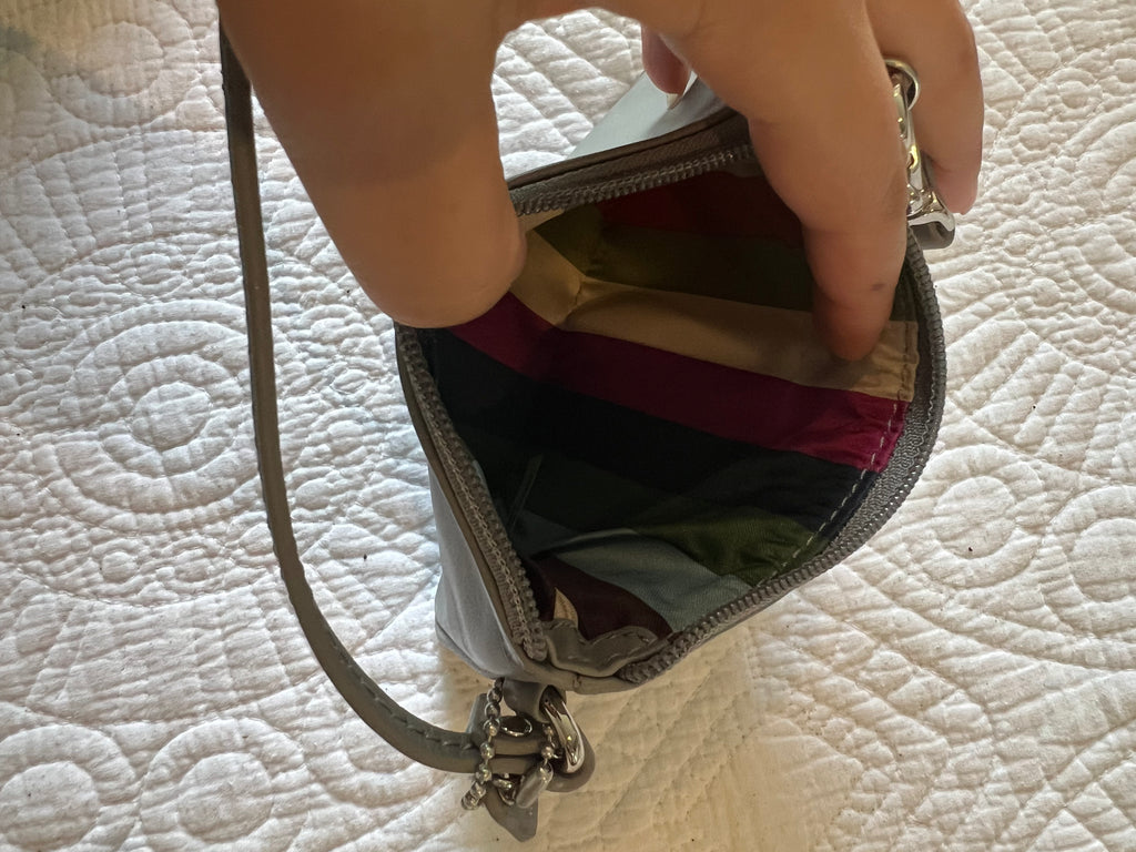 Grey, purse, strap, zipper, brand new condition, very small size