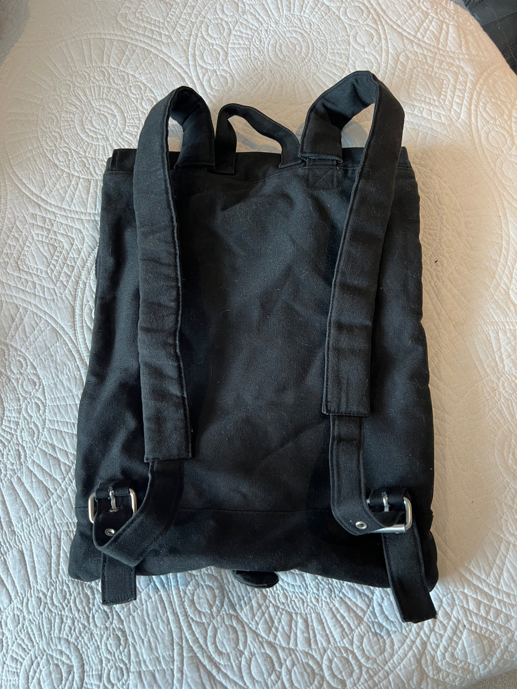 Black sachel backpack, fabric material