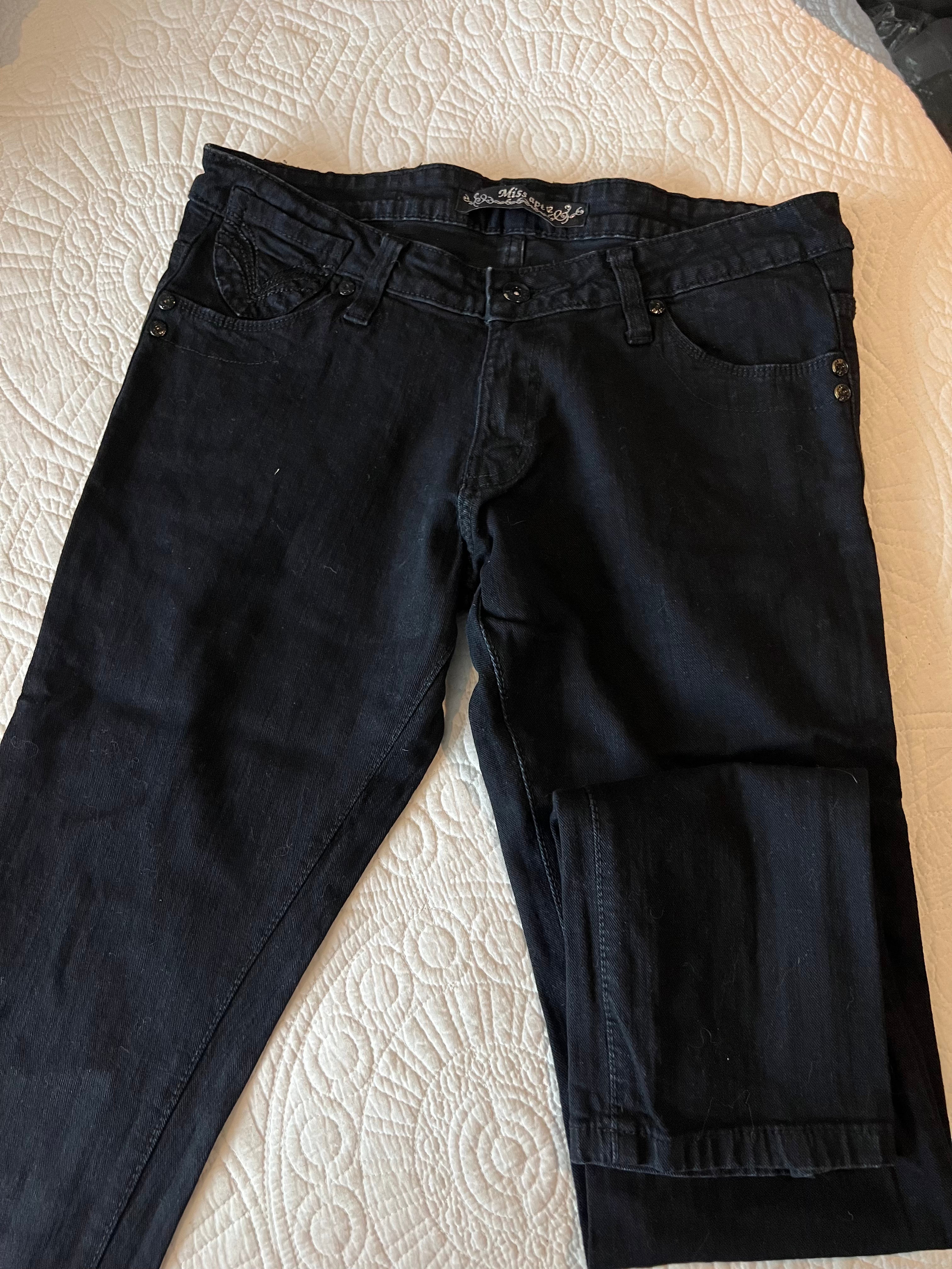 Low rise black jeans / straight leg / sequin feature on back