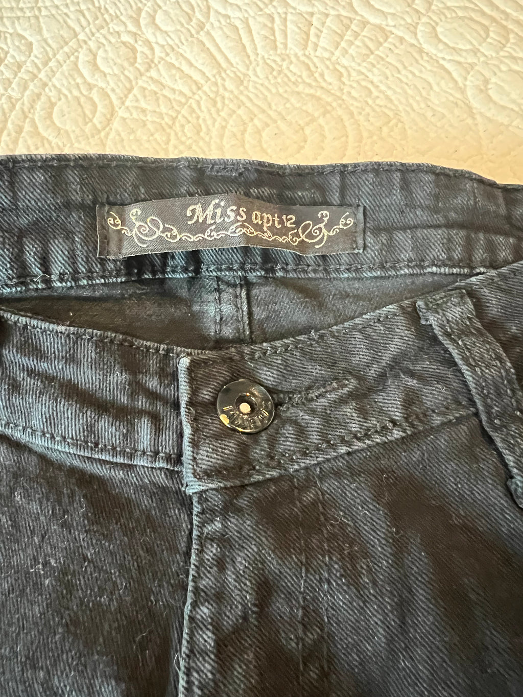 Low rise black jeans / straight leg / sequin feature on back