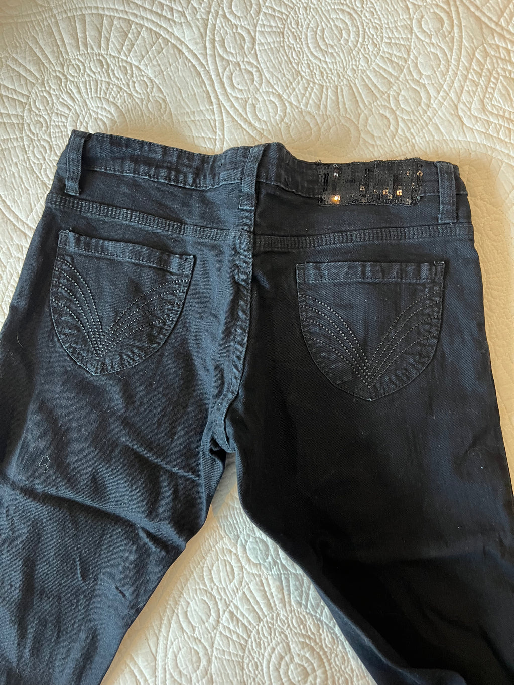 Low rise black jeans / straight leg / sequin feature on back
