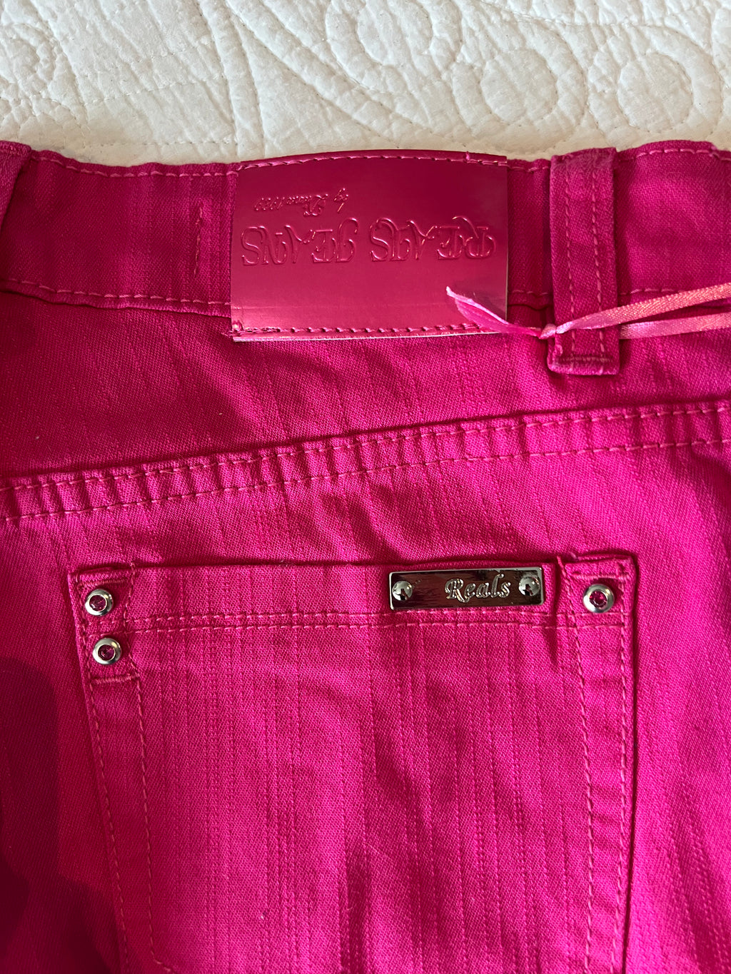 Hot pink jeans / low rise / straight leg