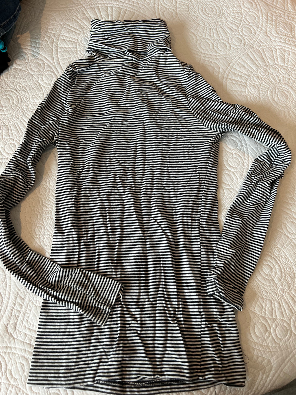 Black and white stripy turtle neck top