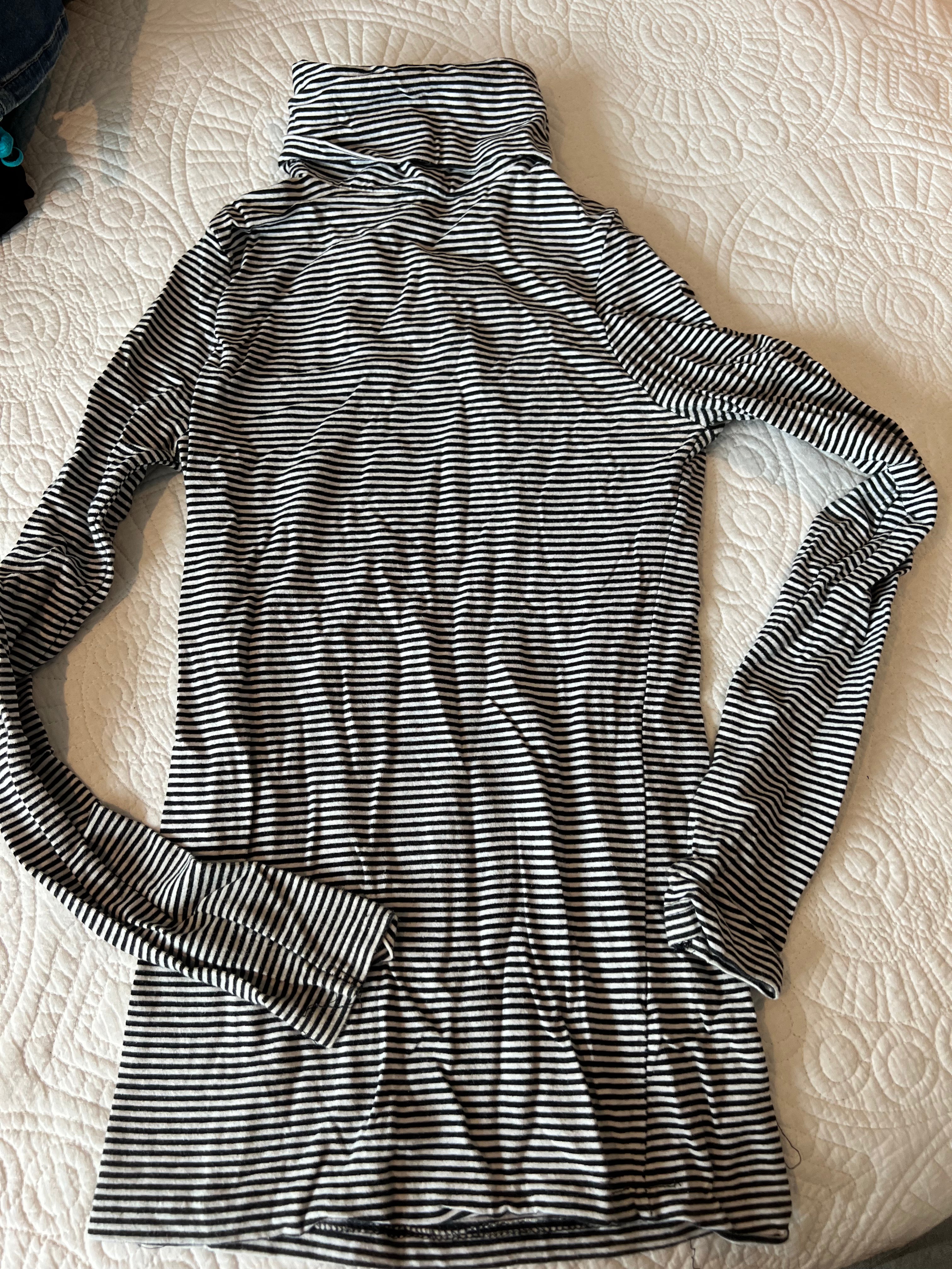 Black and white stripy turtle neck top