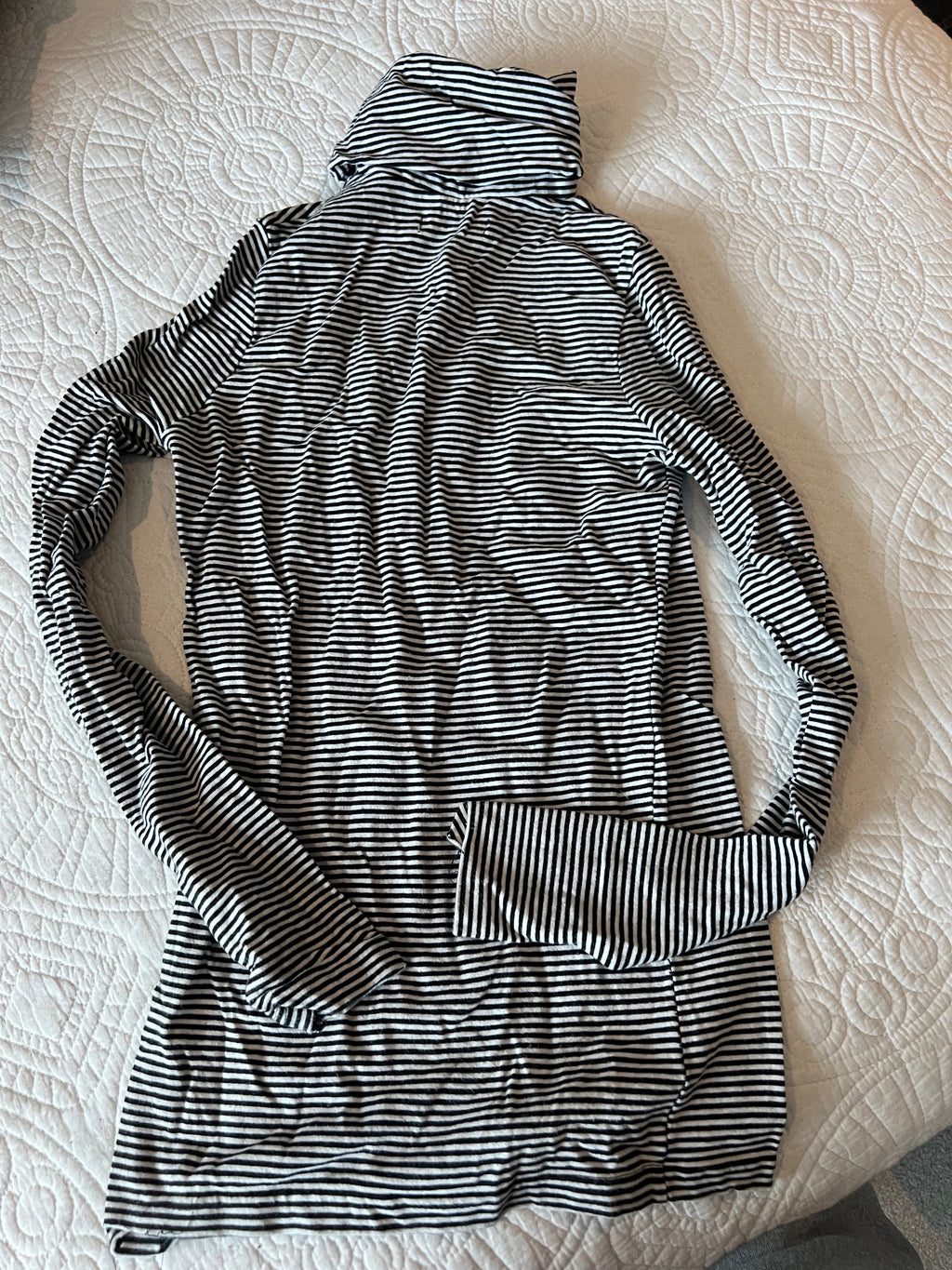 Black and white stripy turtle neck top