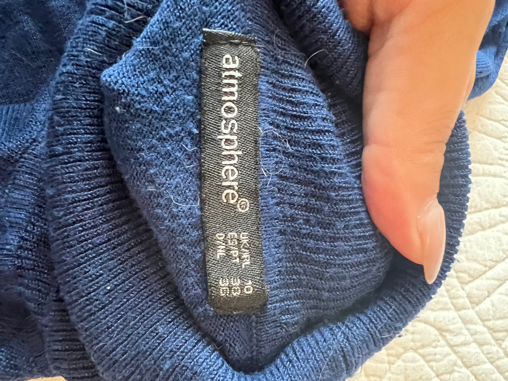 Navy long sleeve turtleneck top, small rip by neckline (see pics), size 10
