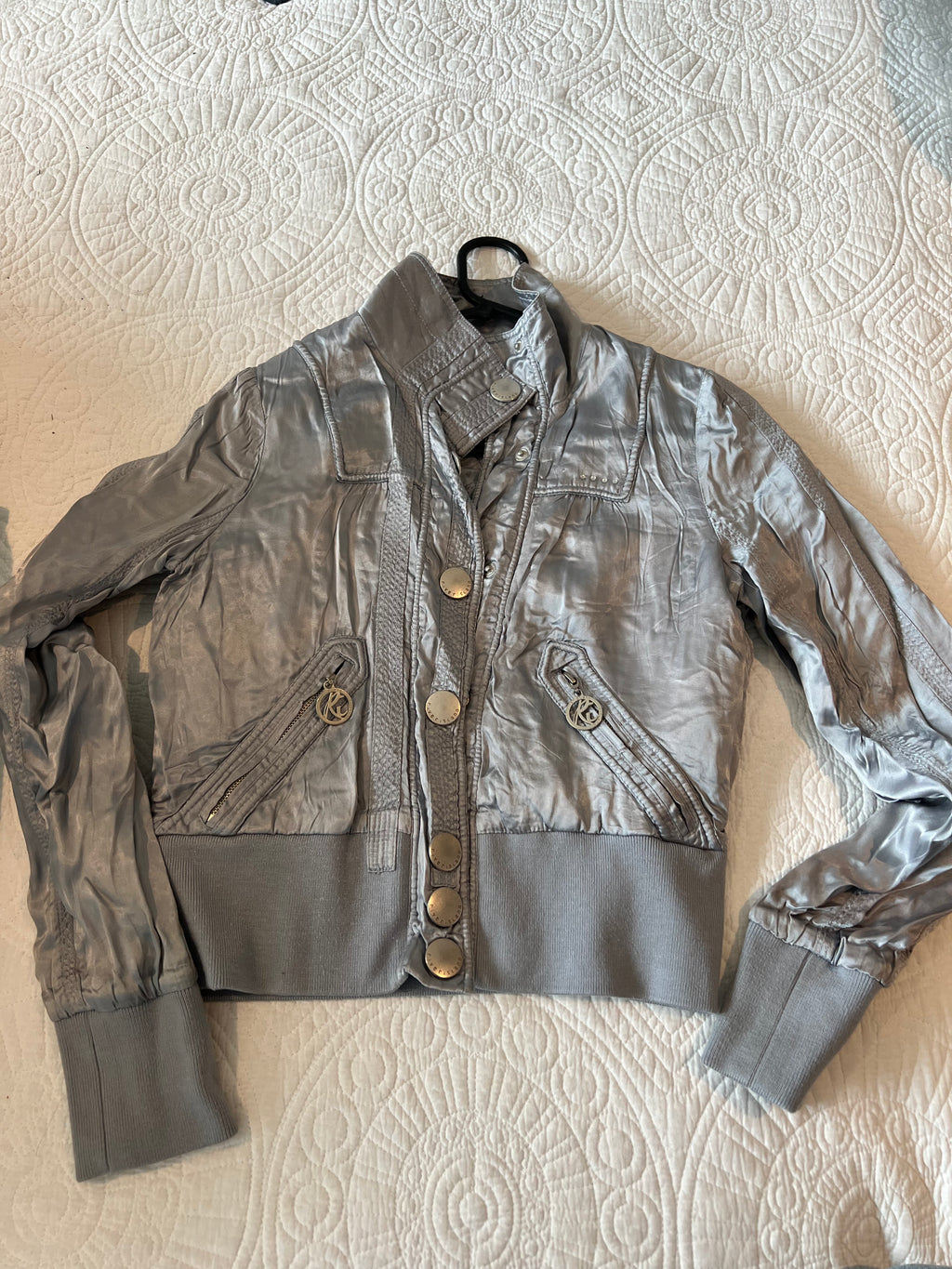 Silver jacket / thin stain effect material