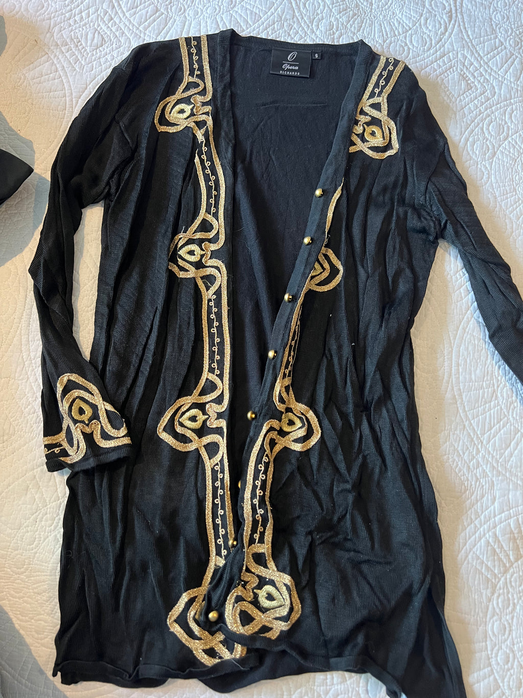 Long black cardigan with gold detailing