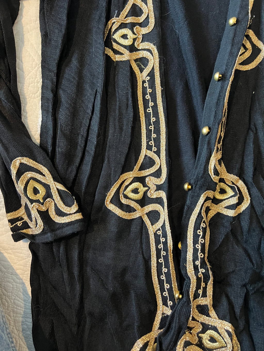 Long black cardigan with gold detailing