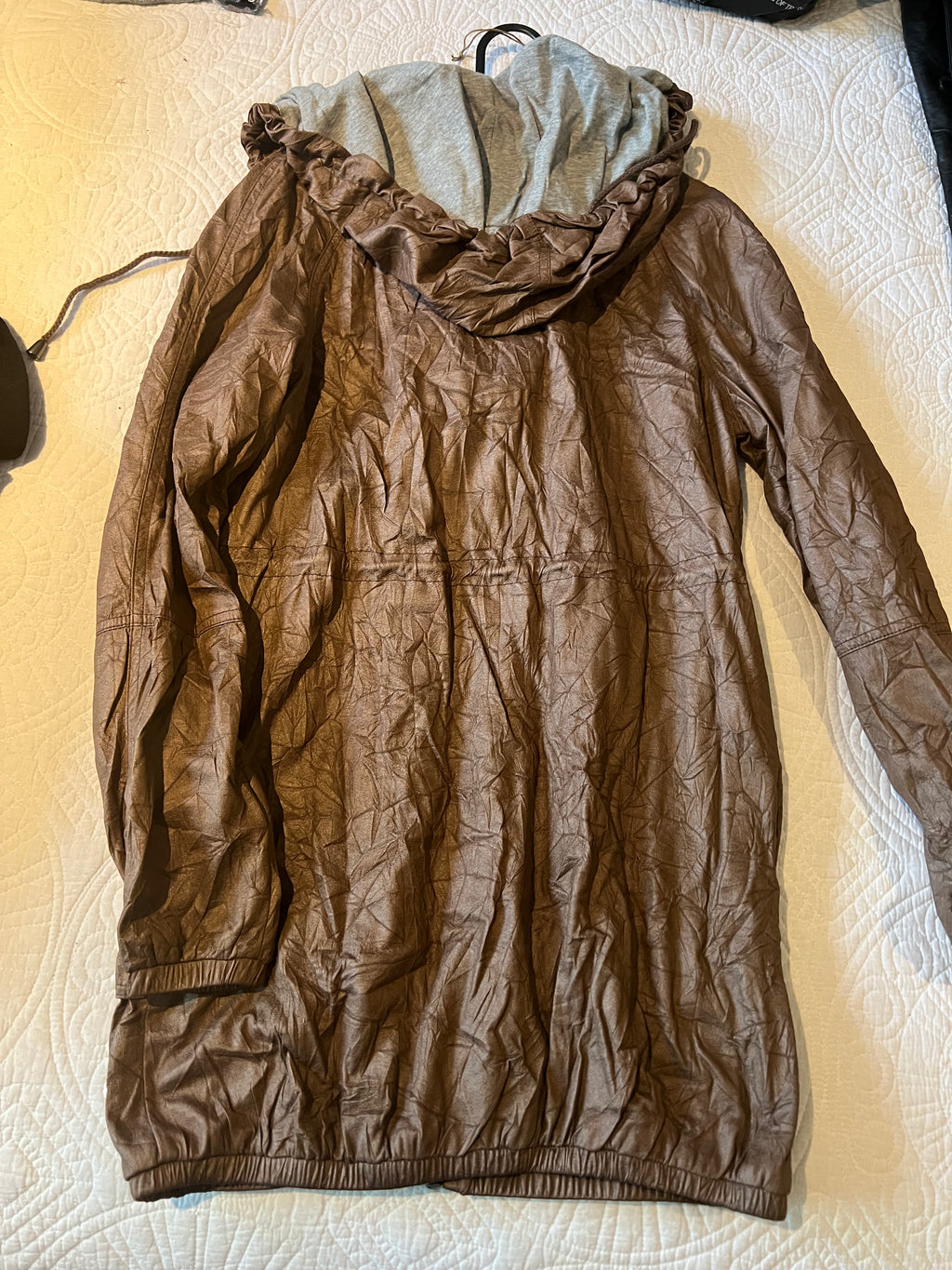 Long brown coat with drawstrings