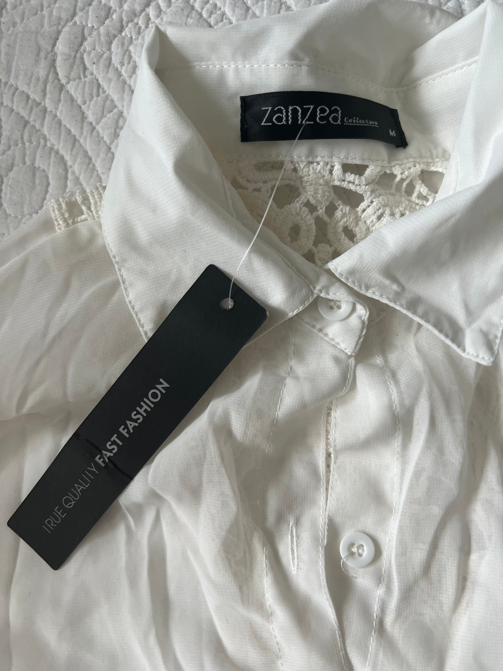 White sheer shirt with lace detail on the back