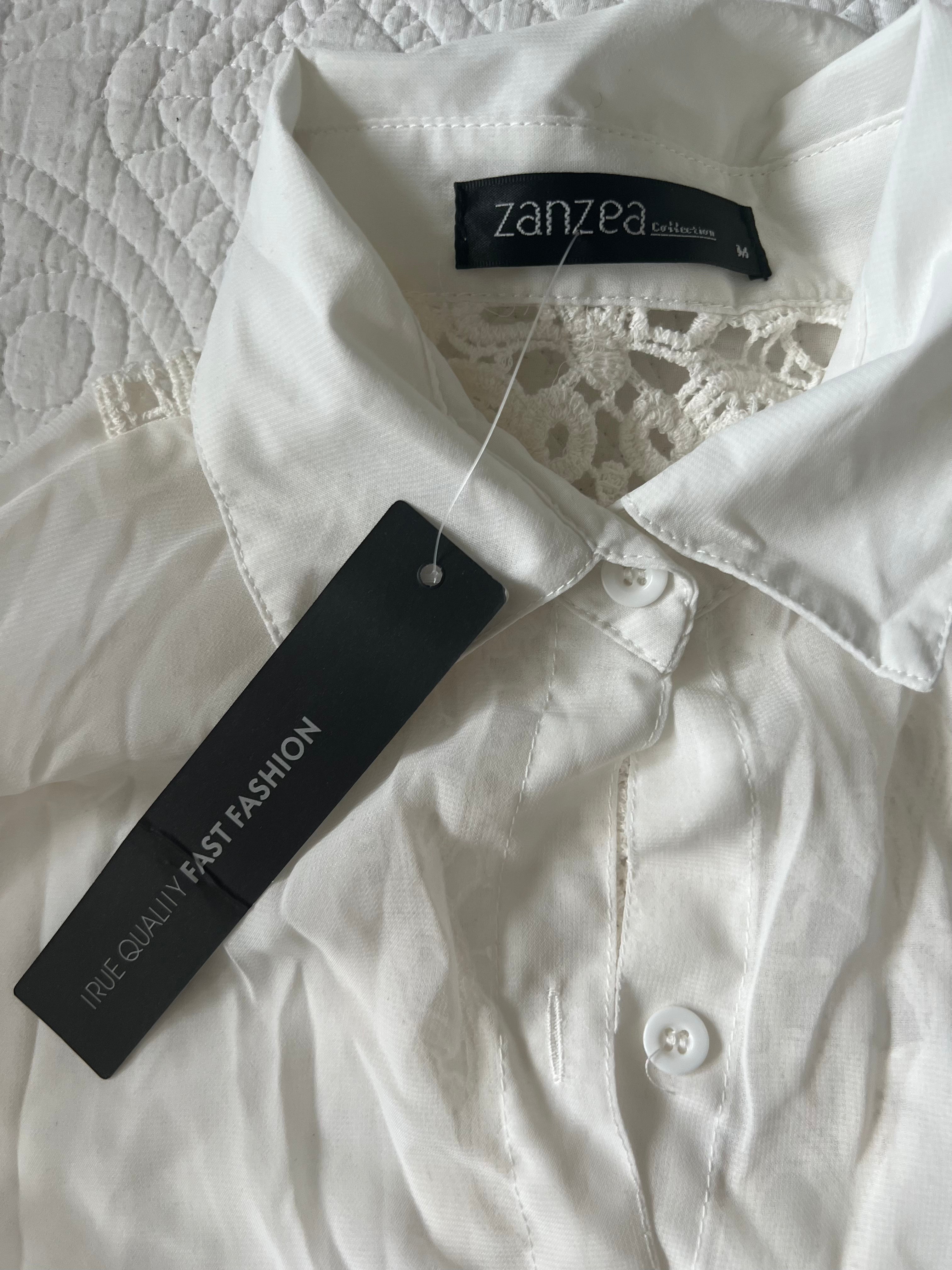 White sheer shirt with lace detail on the back