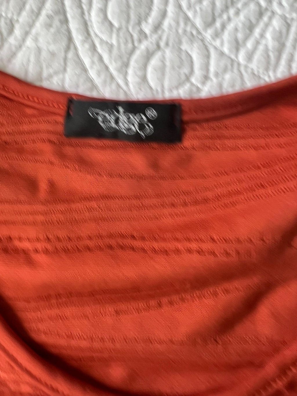 Orange textured mini dress