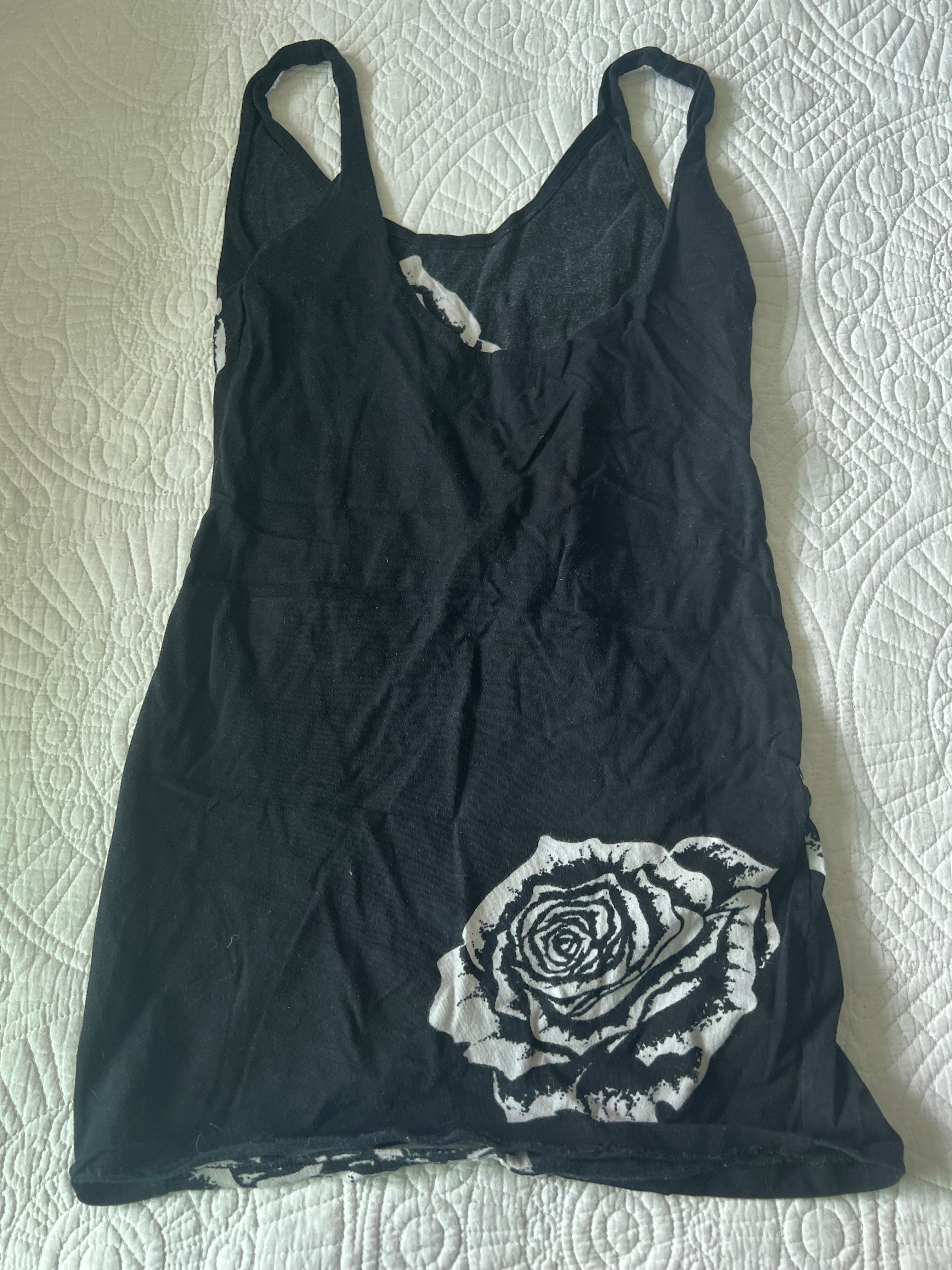 Black top with white rose details