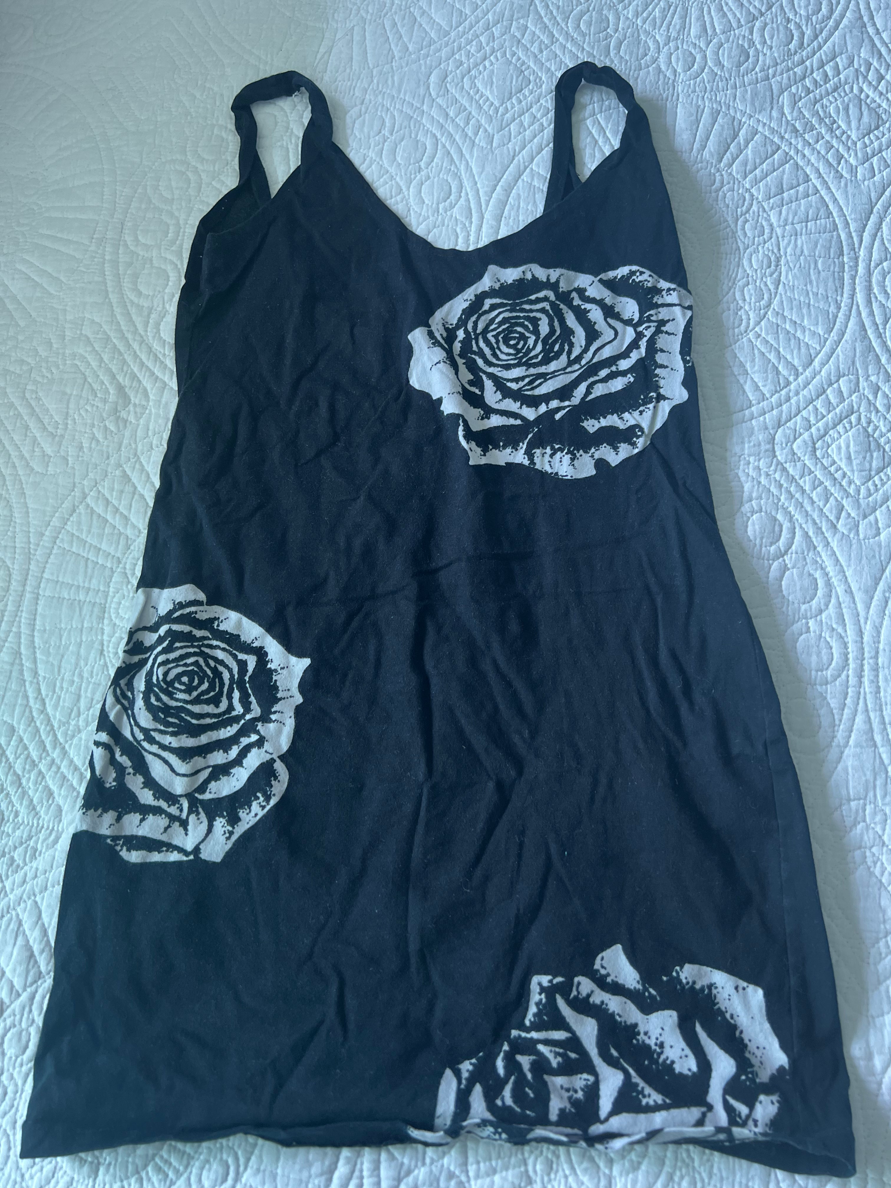 Black top with white rose details