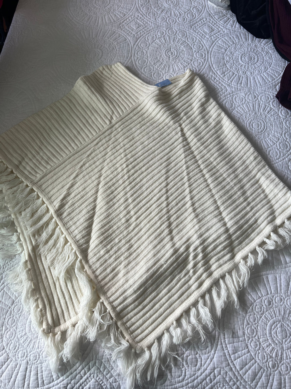 White knitted shawl with fringe