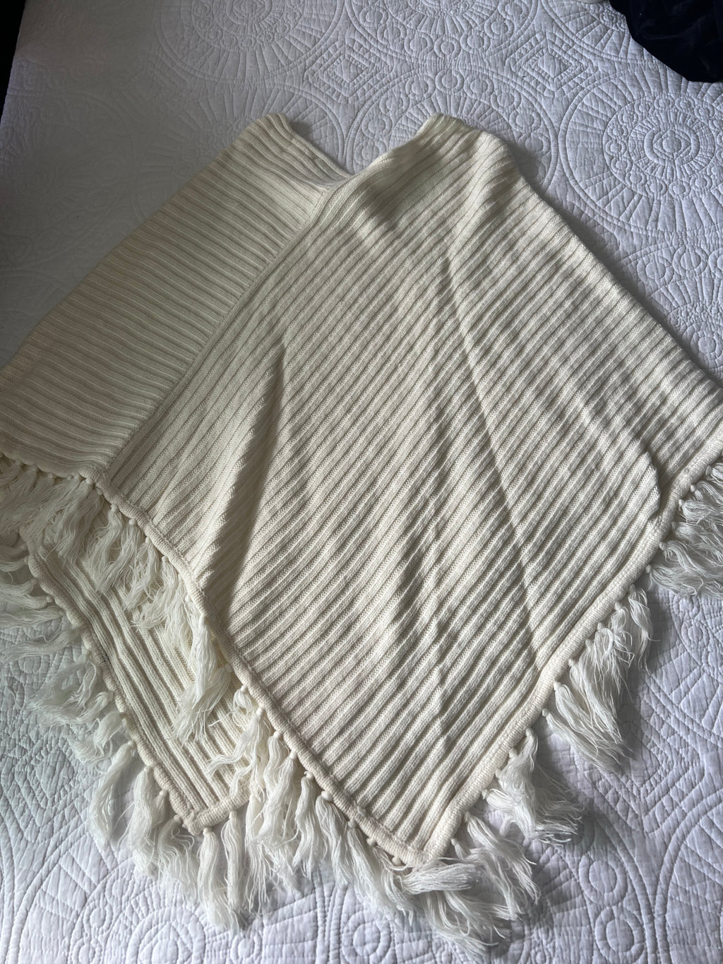White knitted shawl with fringe