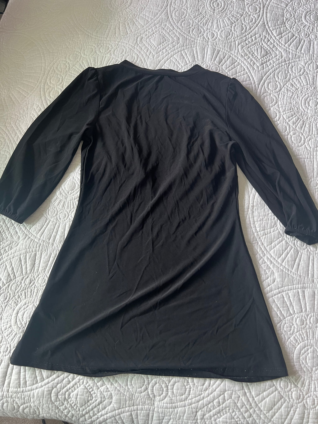 Black low cut mini dress