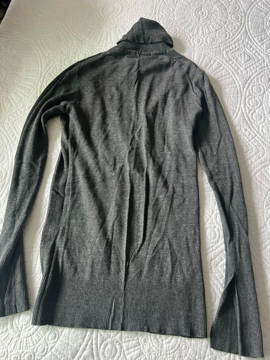 Grey knitted long sleeve turtle neck jumper