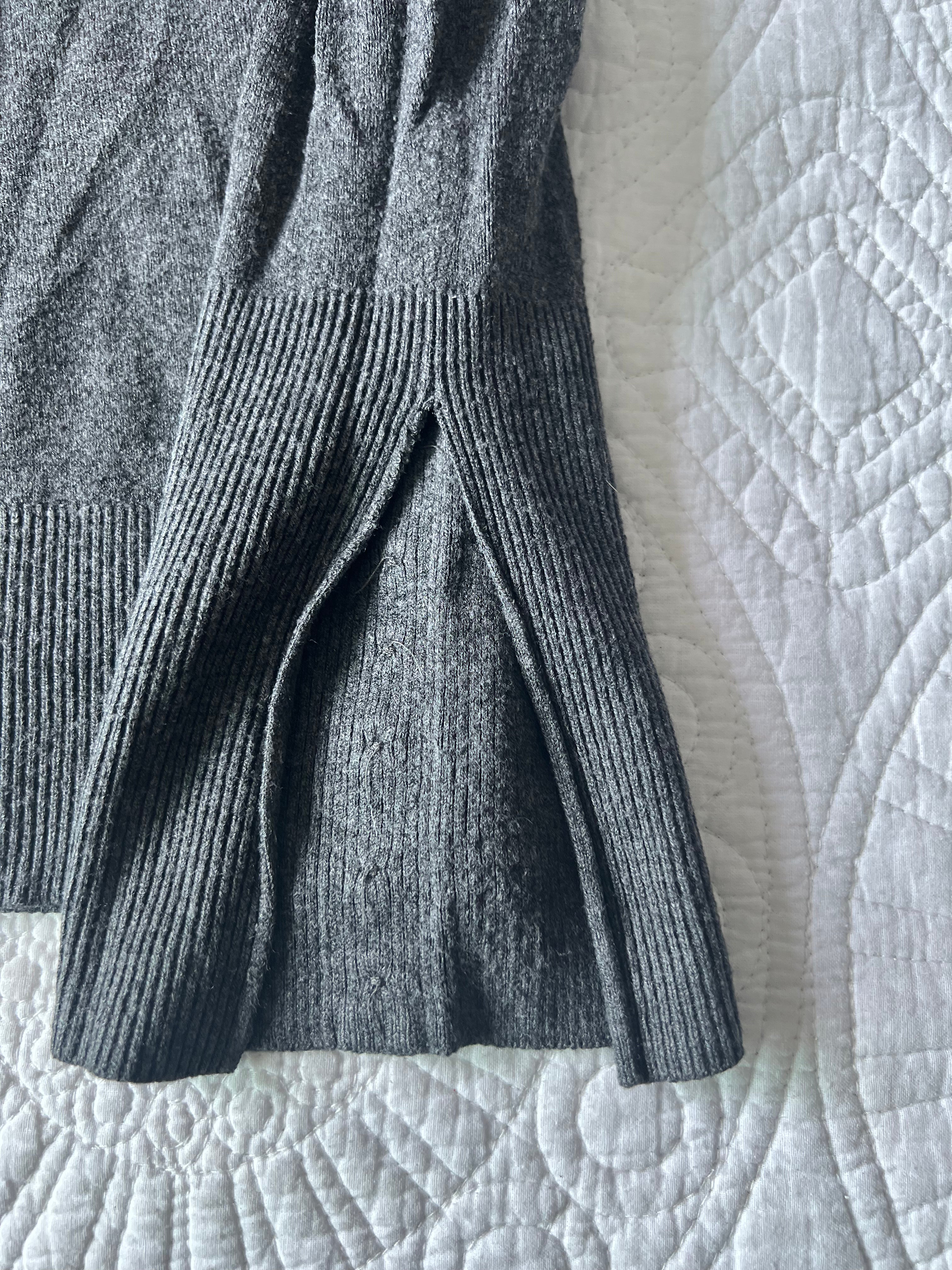 Grey knitted long sleeve turtle neck jumper