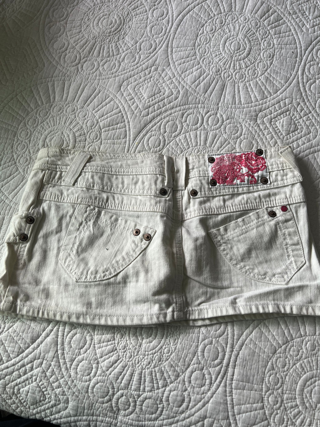 Mini white denim skirt