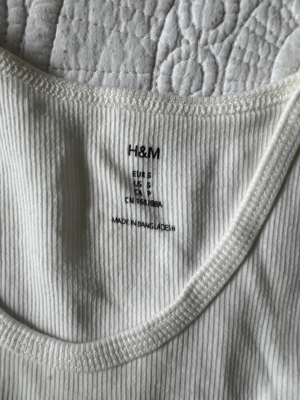 White ribbed vest