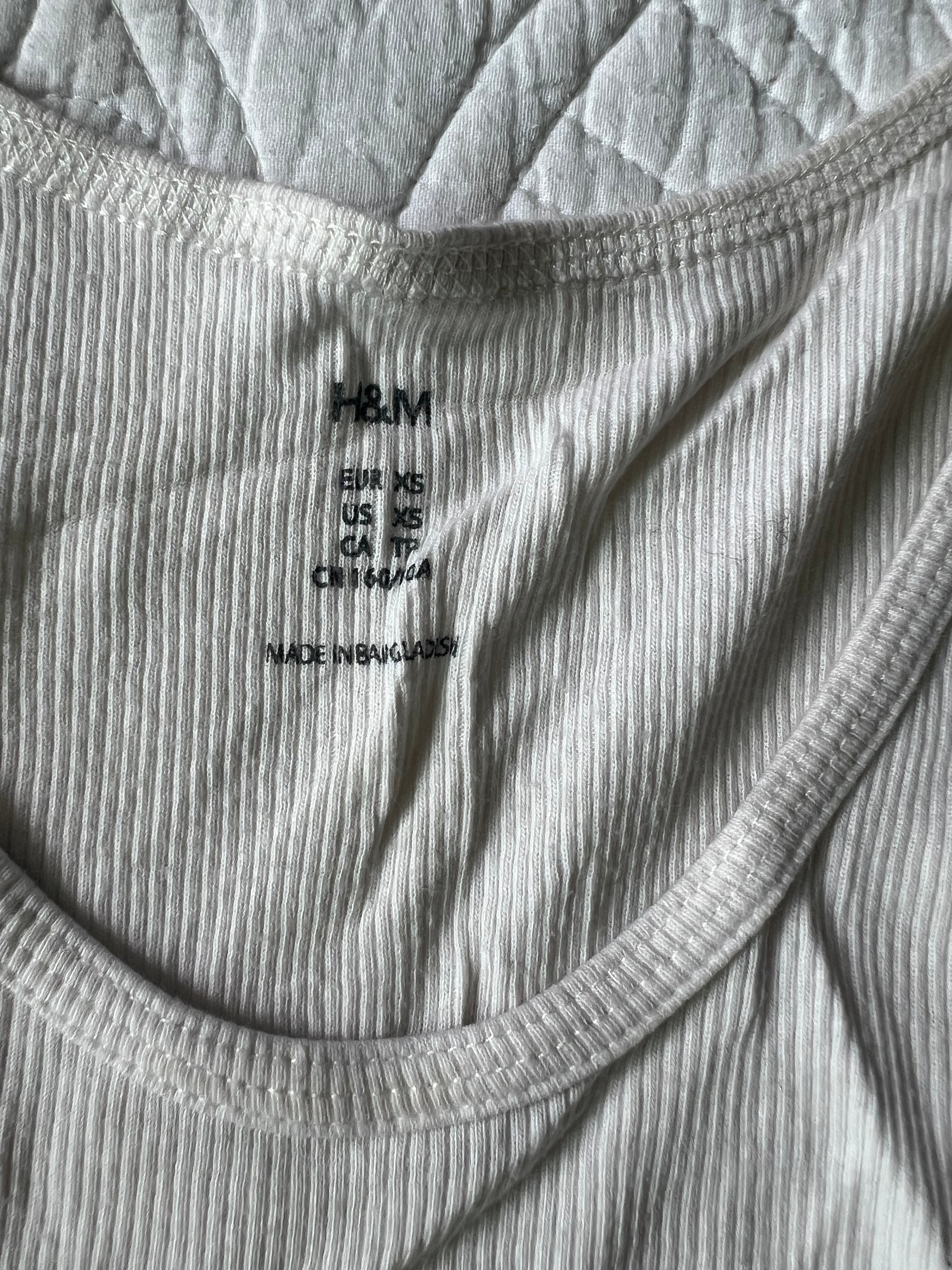 White ribbed vest