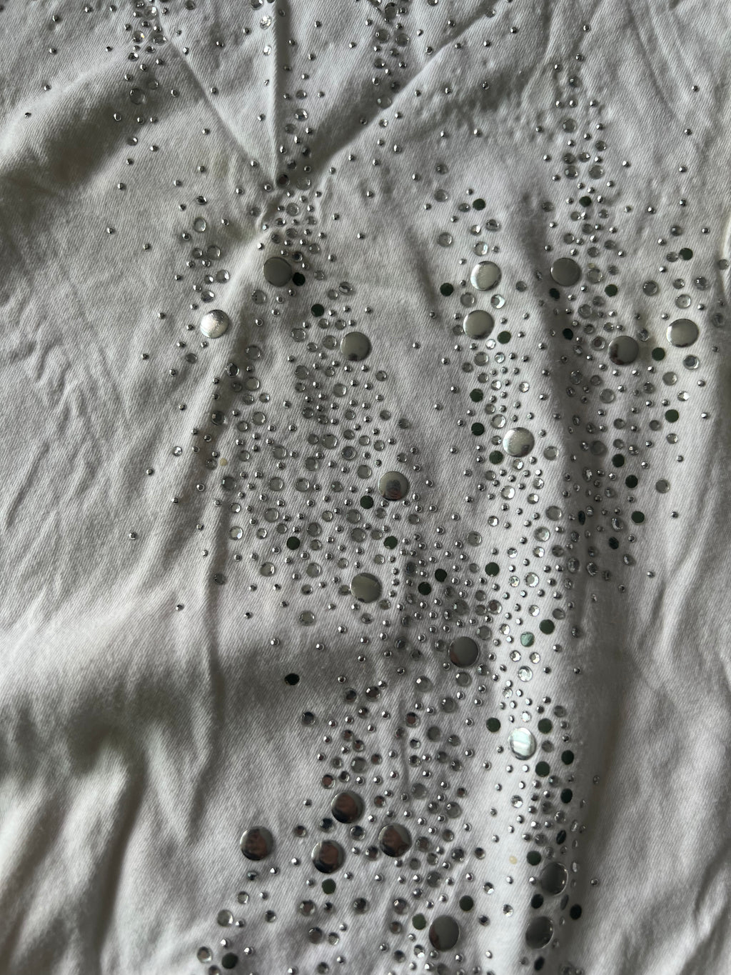 White top with jewels
