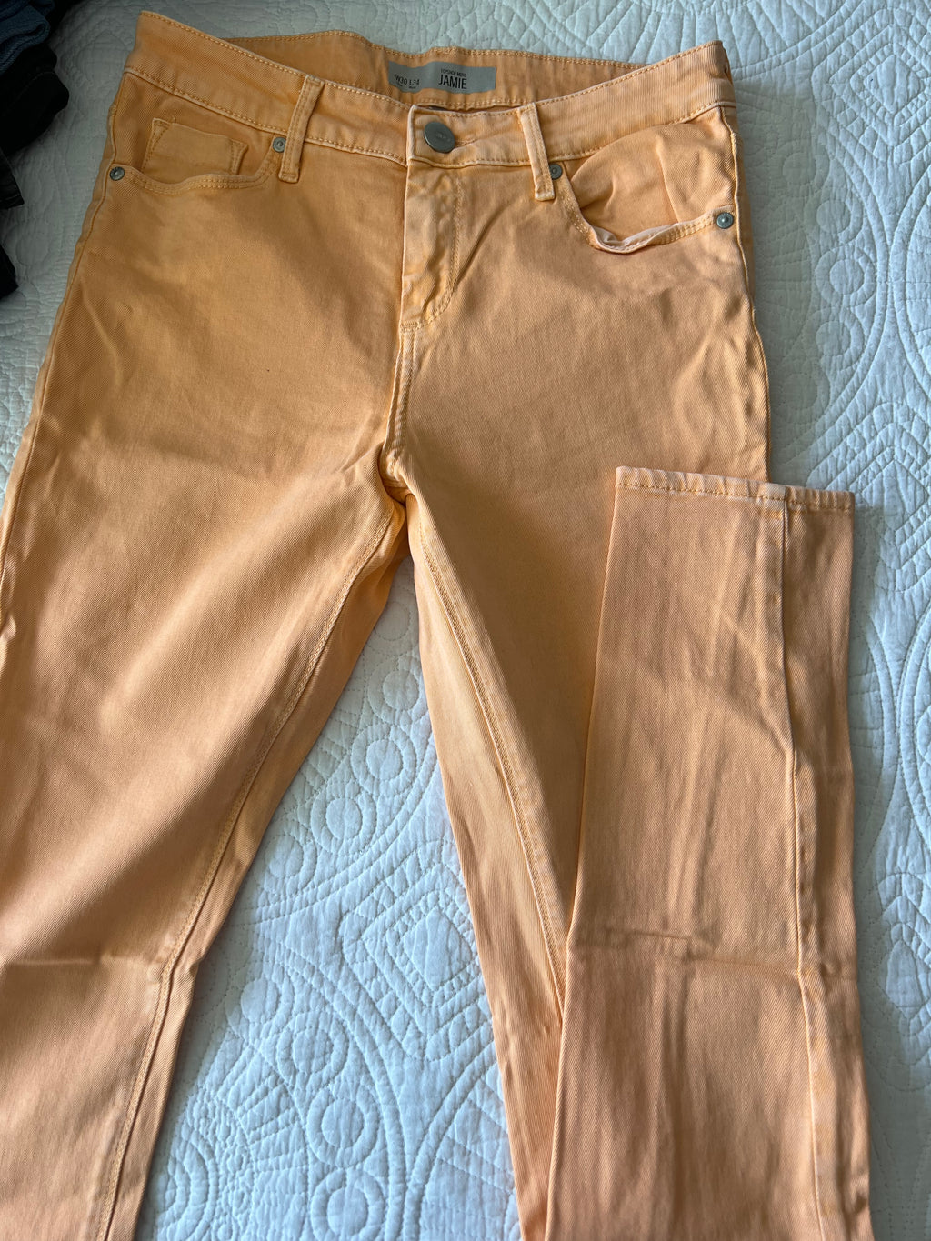 Orange skinny jeans