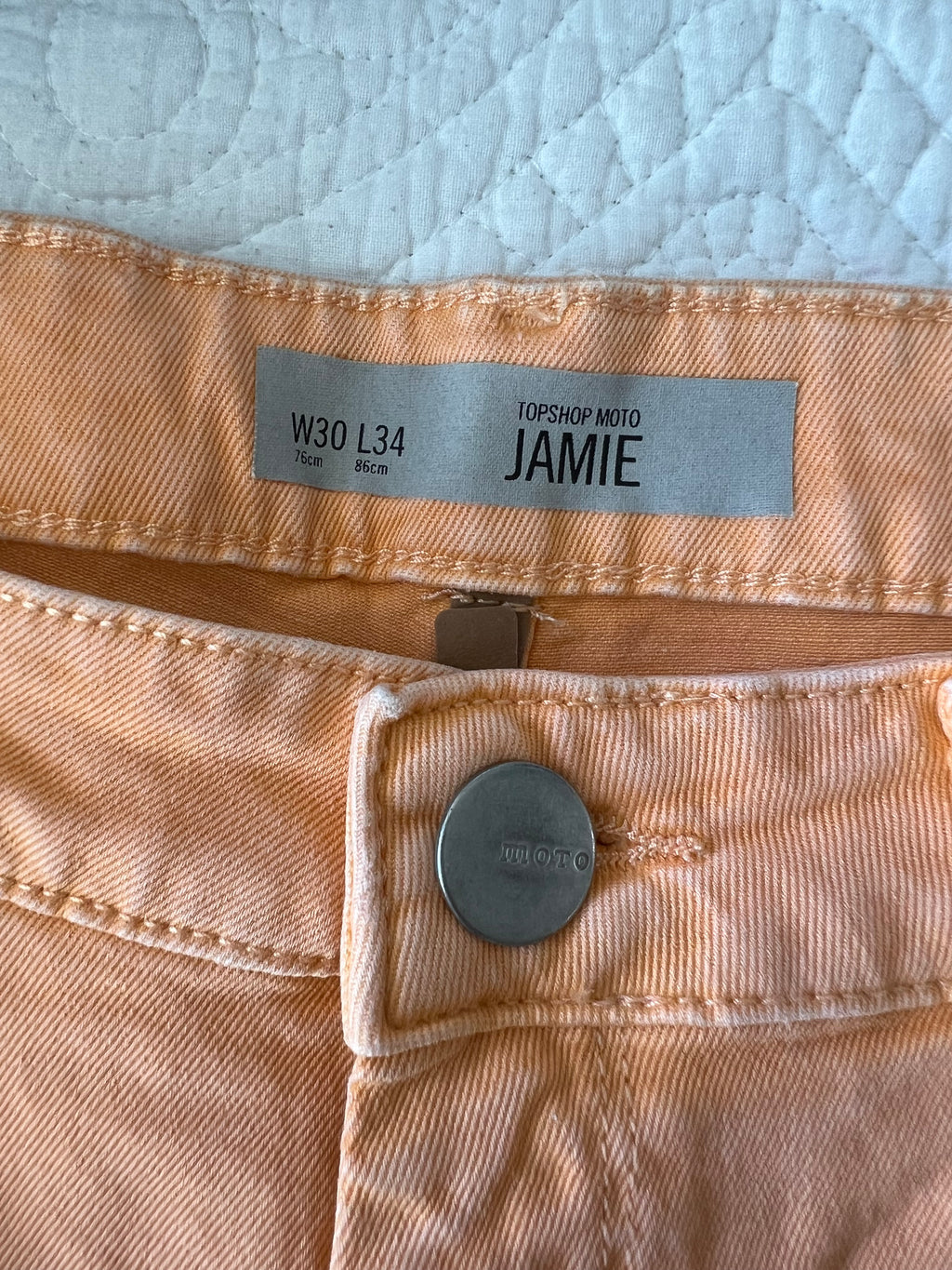 Orange skinny jeans