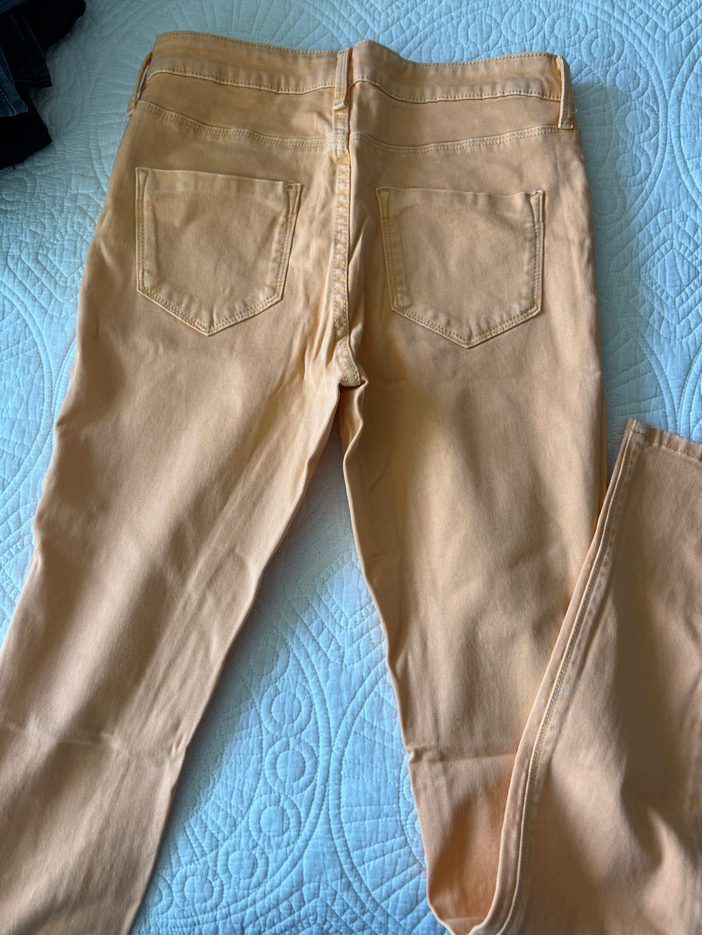 Orange skinny jeans