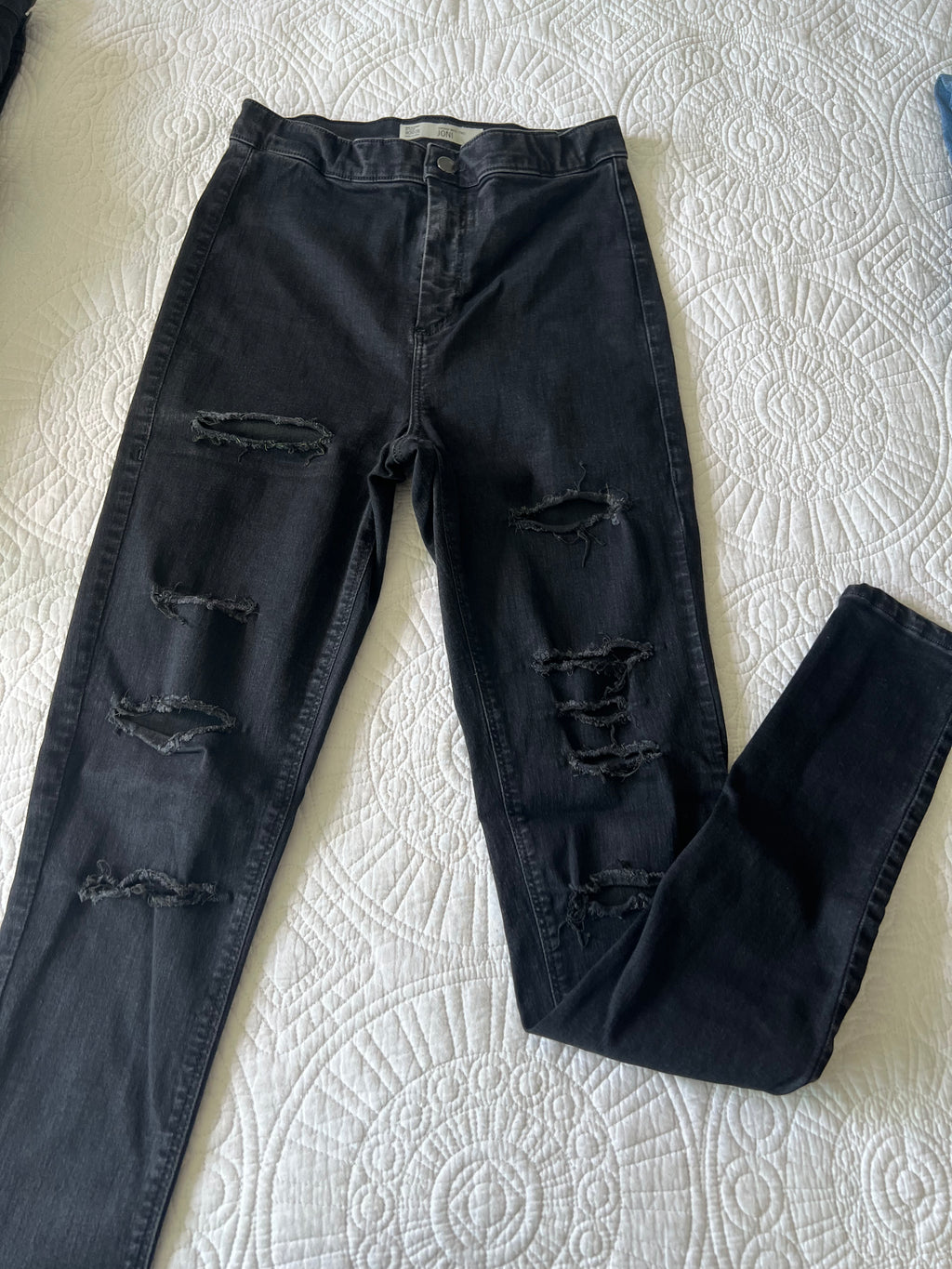 Black ripped jeans