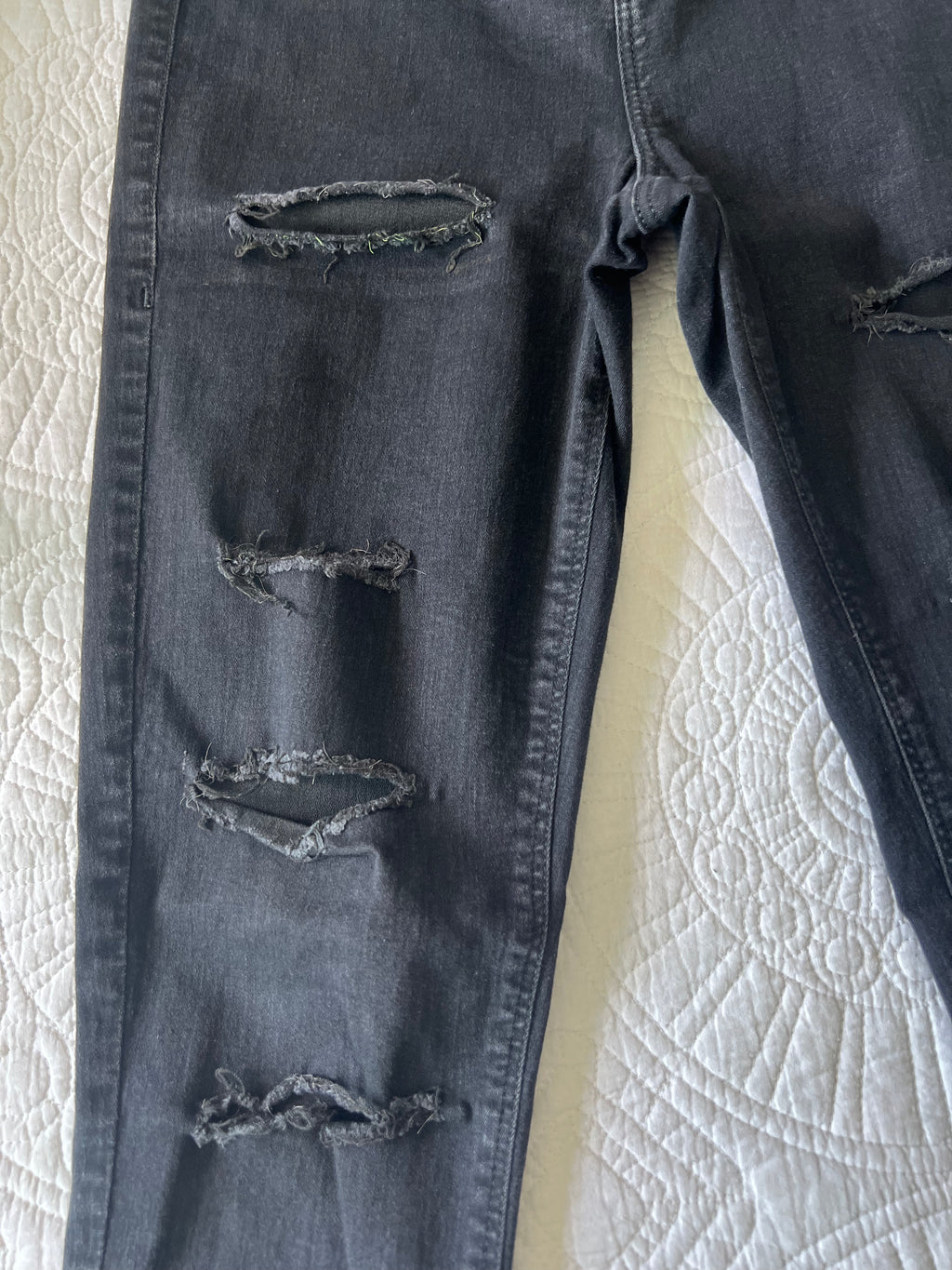 Black ripped jeans