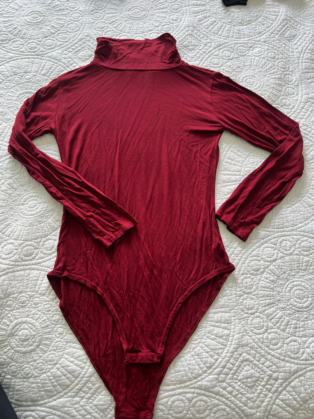 Red turtle neck bodysuit