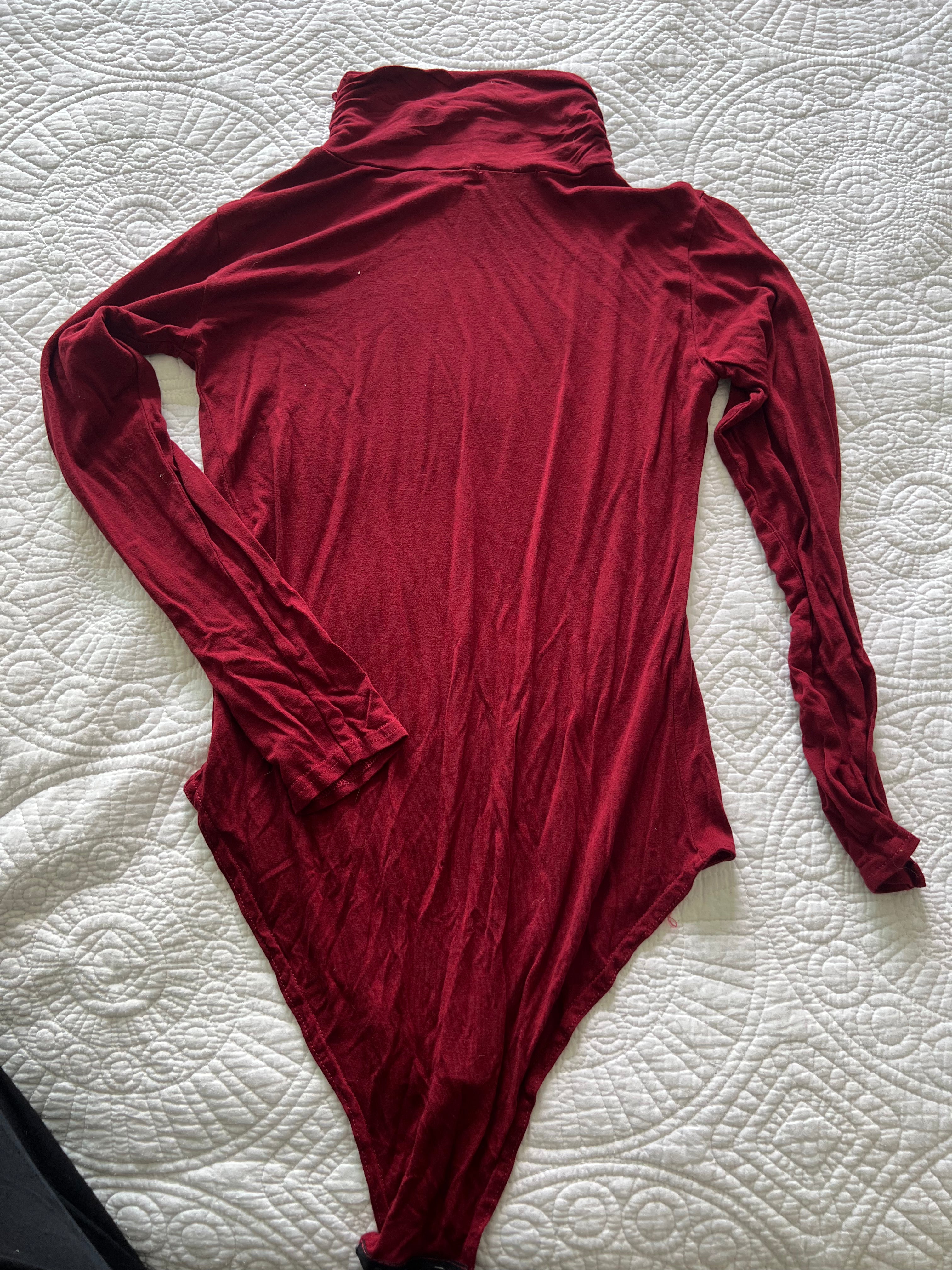 Red turtle neck bodysuit