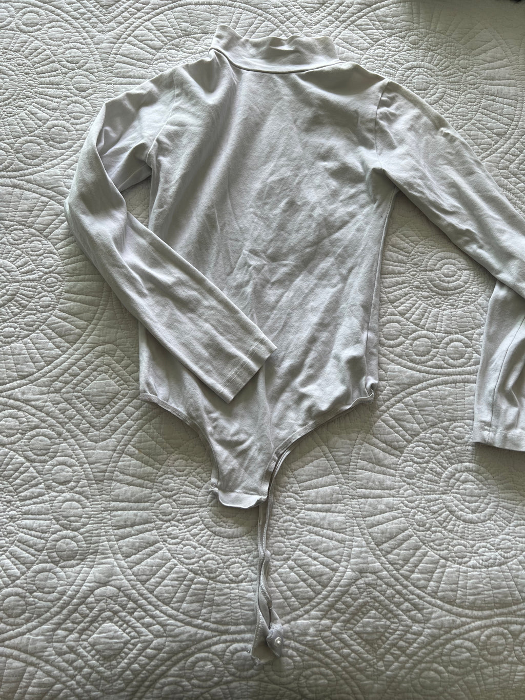 White thong bodysuit