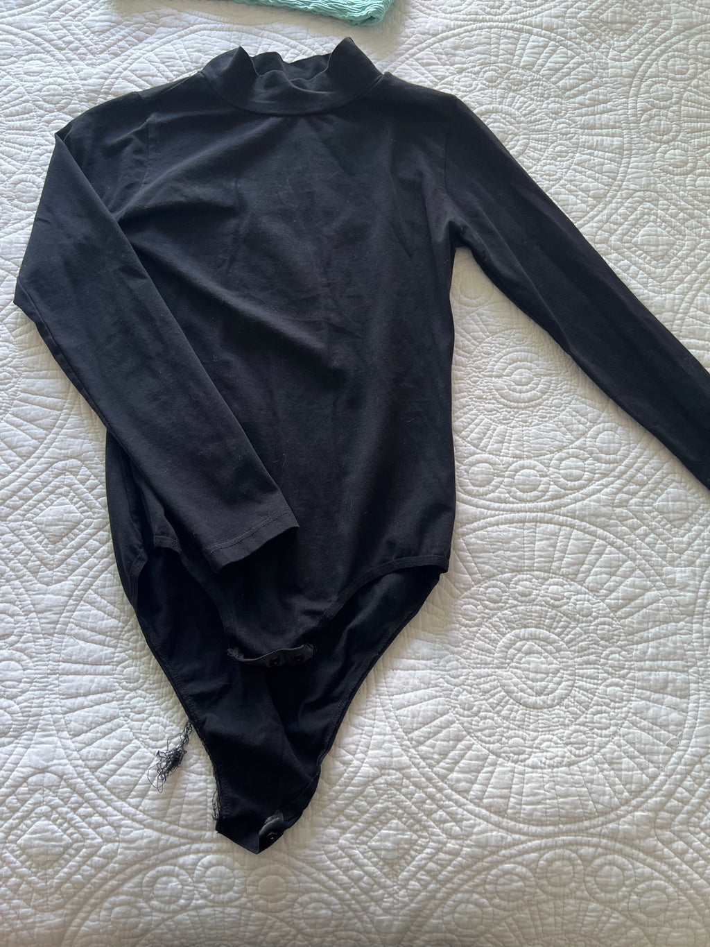 Black turtle neck bodysuit