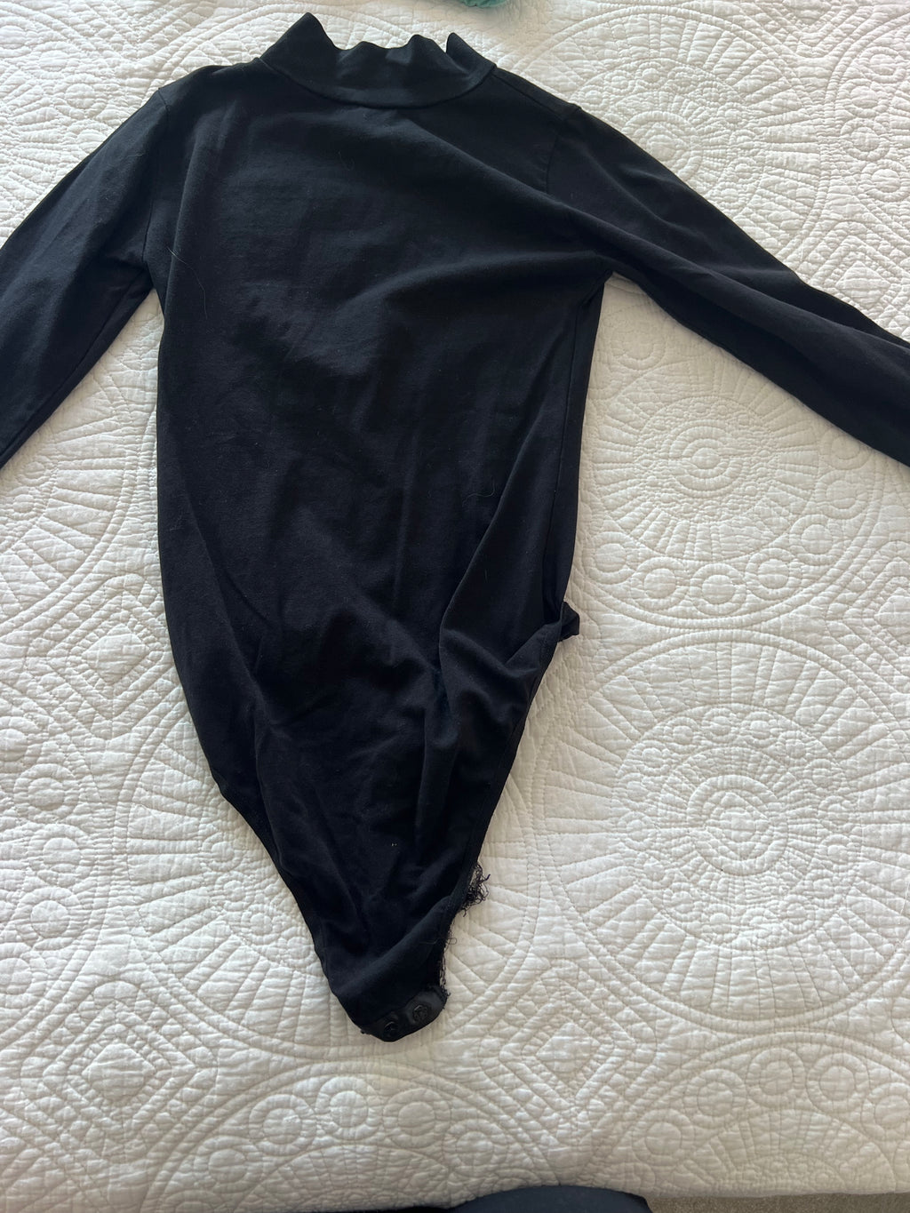 Black turtle neck bodysuit